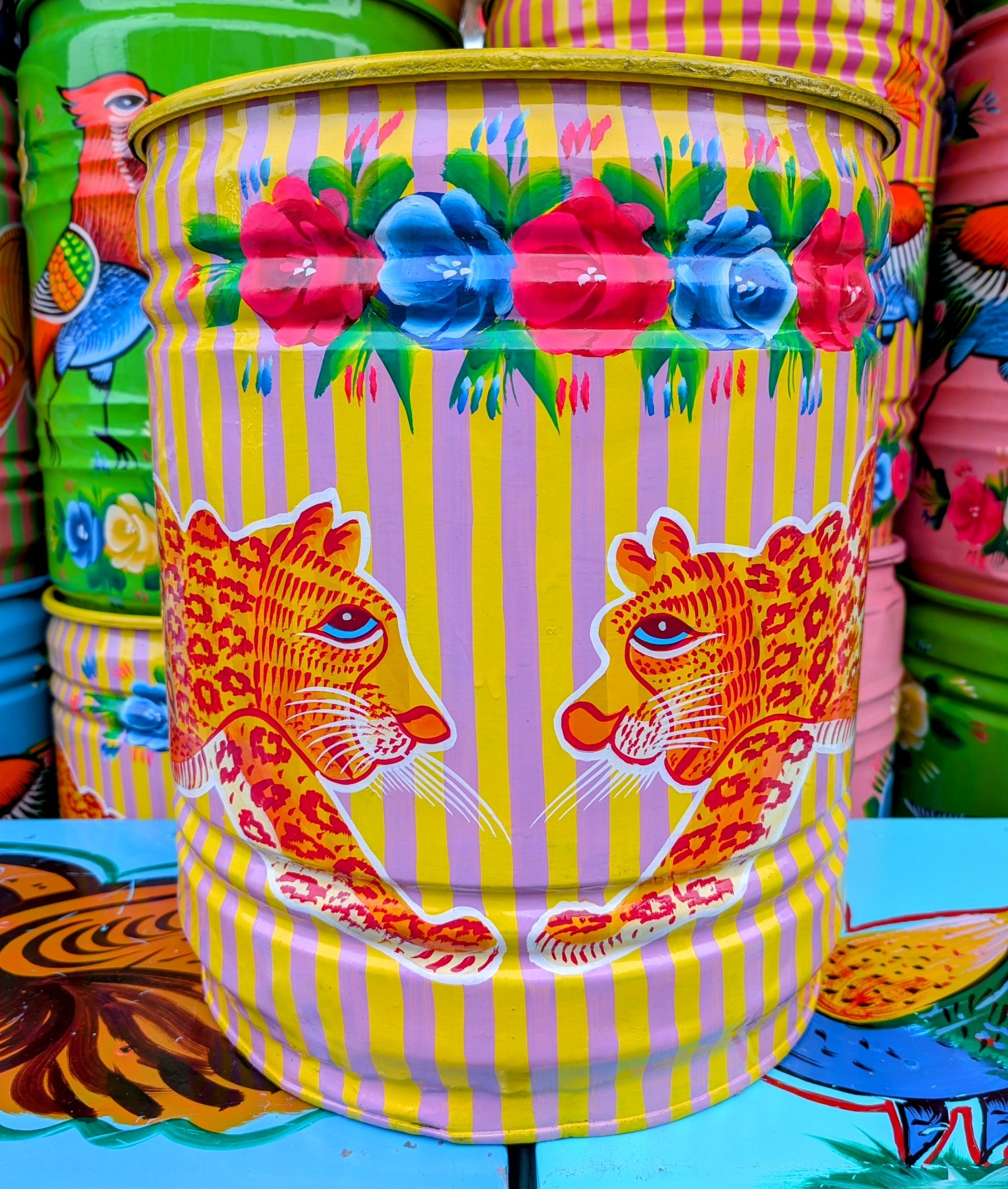 Large recycled truck art barrels