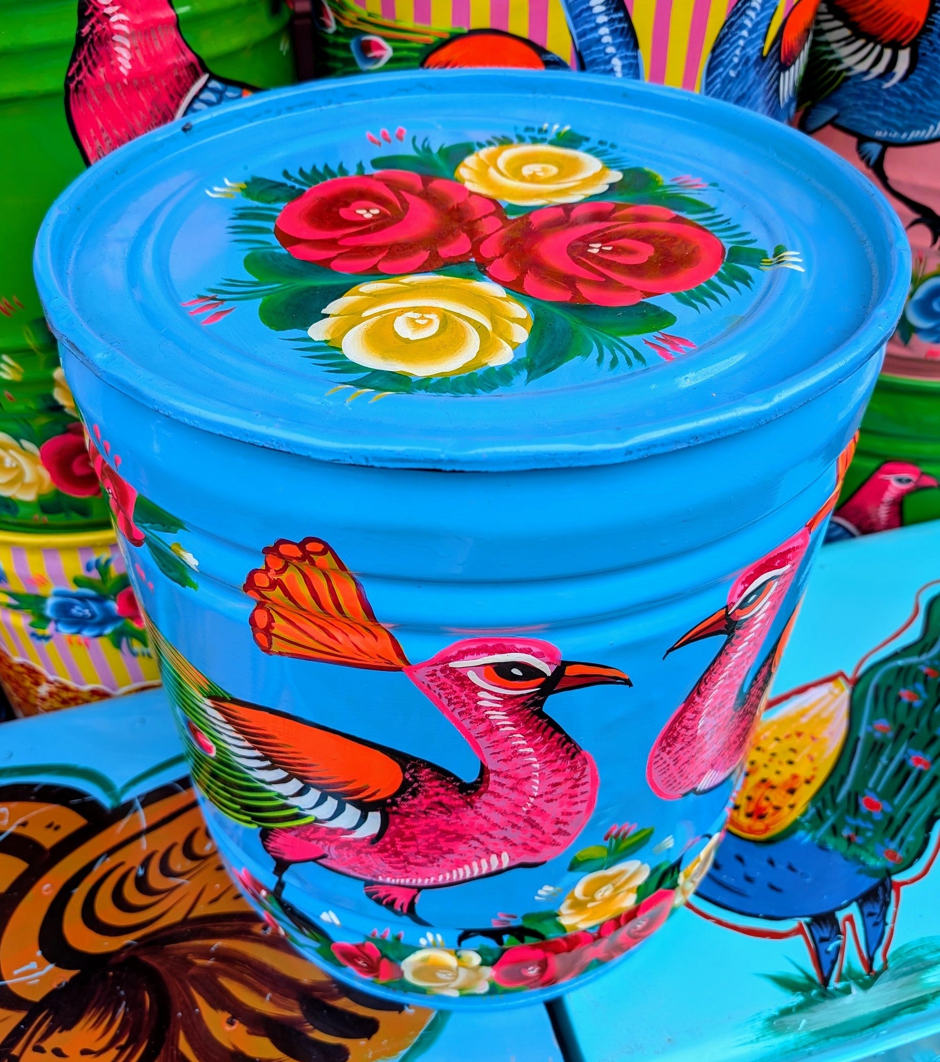 Large recycled truck art barrels