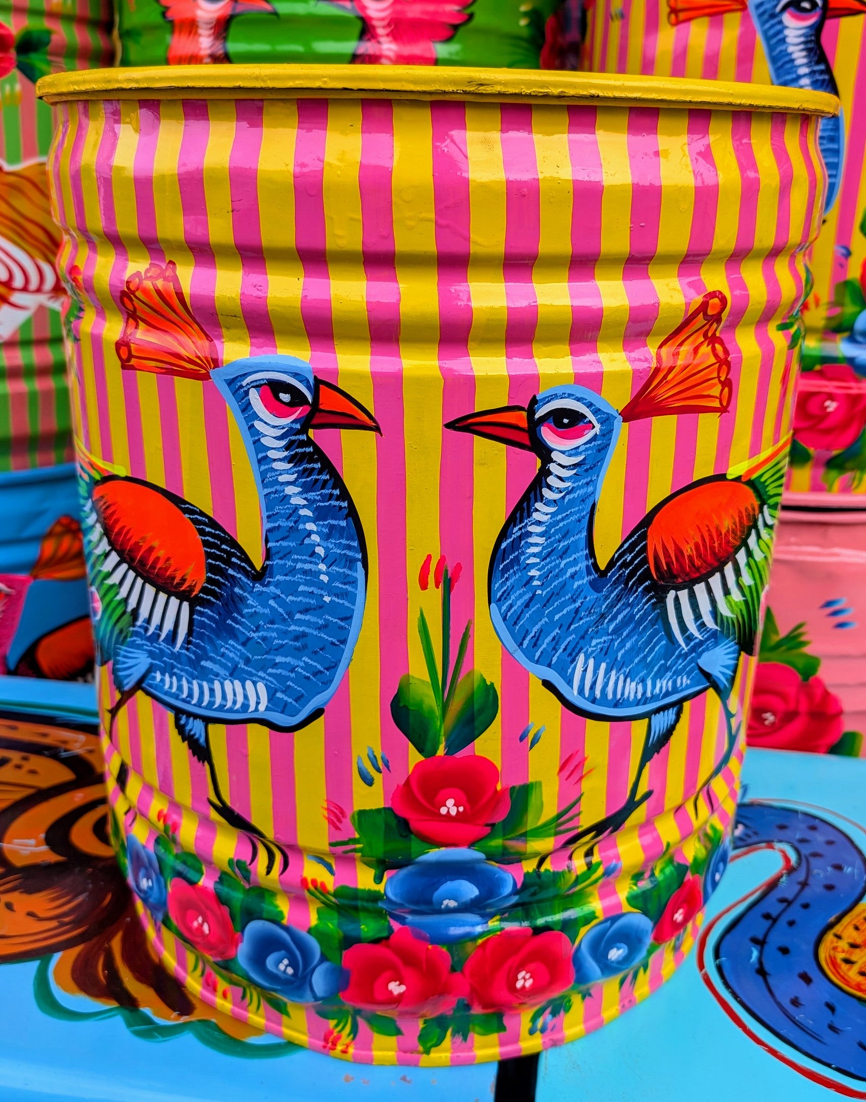 Large recycled truck art barrels
