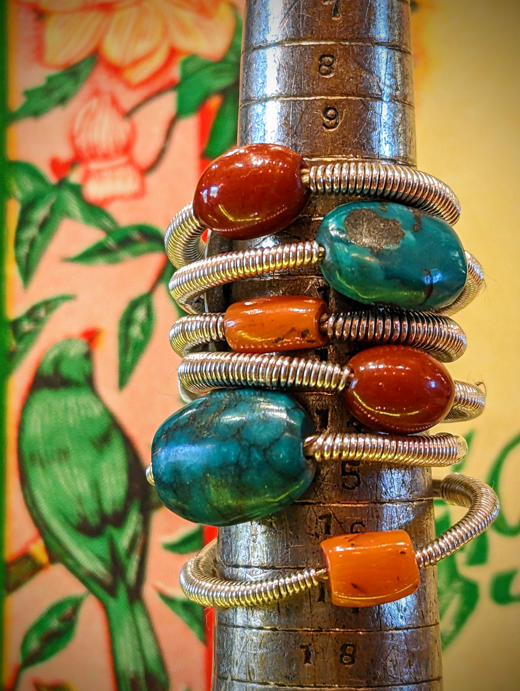 Antique turquoise,coral and copal beads from mountain tribes of Nepal and Tibet crafted in to gorgeous handmade silver rings, leaving the tactile beauty of these beads for you to enjoy!

Antique turquoise, coral and copal beads set in 925 silver

Rings numbered top to bottom 

