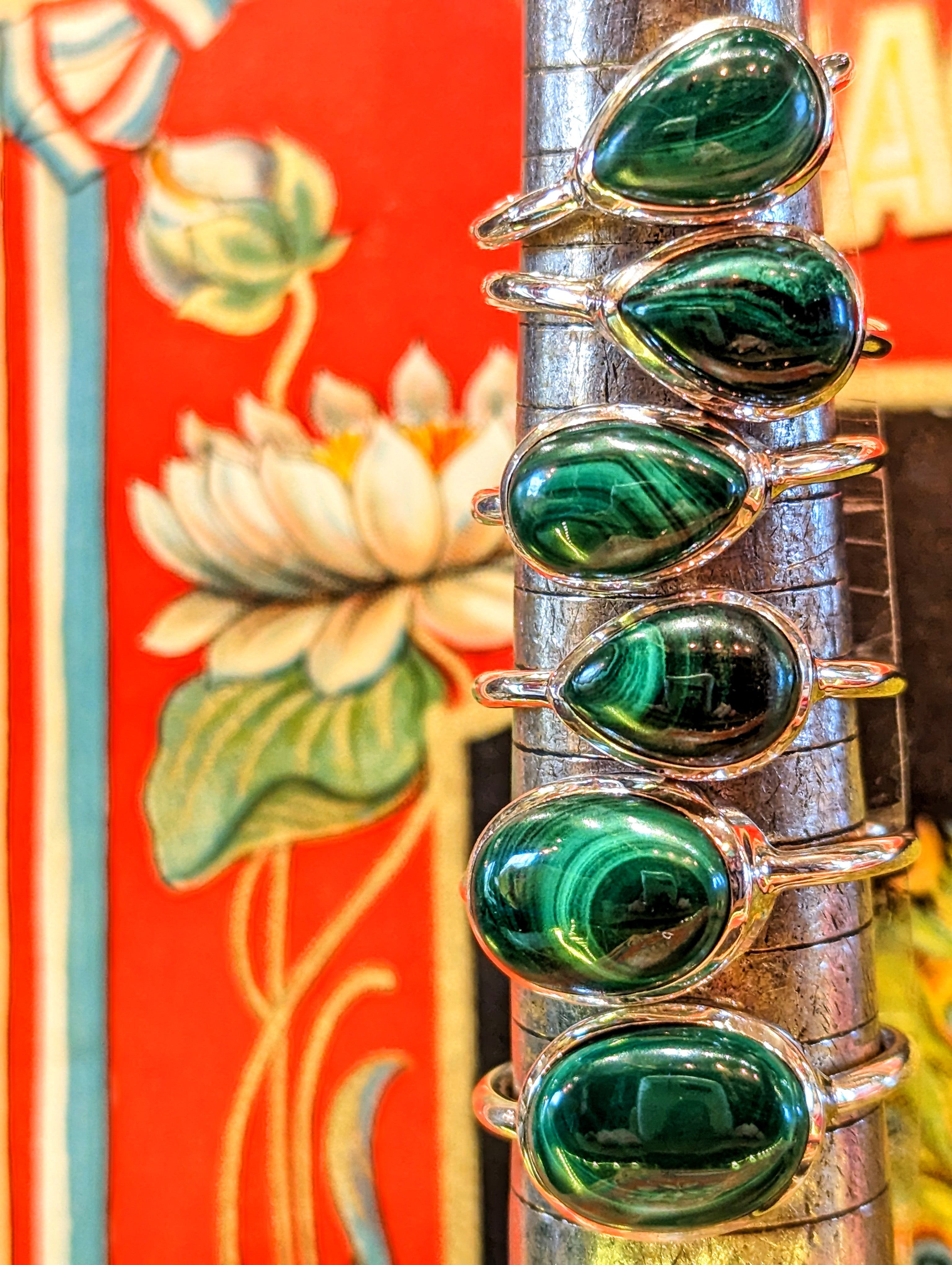Stunning malachite cabochons in silver, stunning stripes and depth of colour.

We source stones directly, choosing every one to be made into rings in India, such a juicy job!

Rings are numbered from the top to the bottom.


