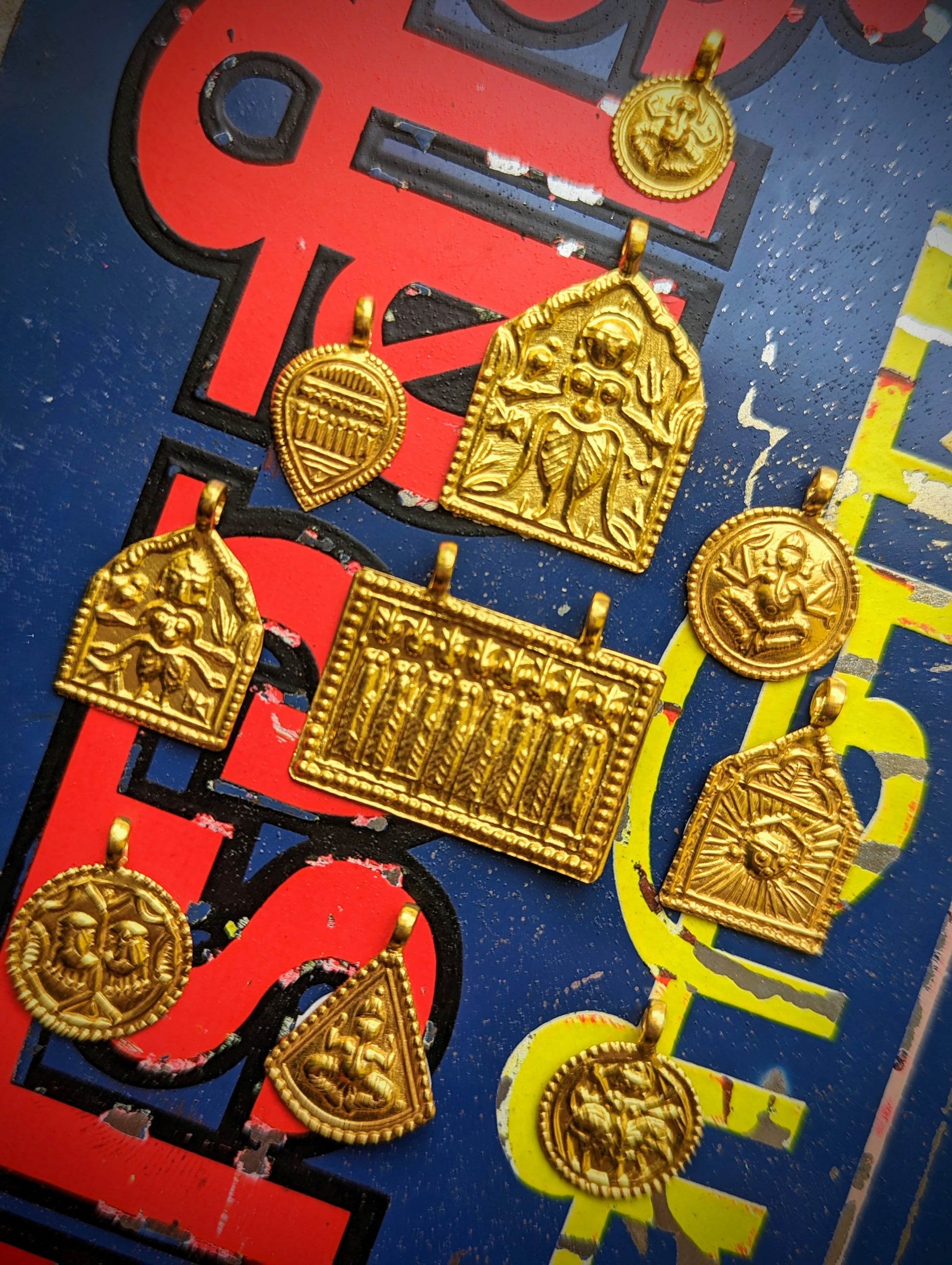 Super light and lovely Gods and goddesses pendants.

Handmade in Rajasthan from silver then plated with 18ct gold.

Wear them on a chain or silk thread, or hang them on hoops from your ears!

Gold plated silver.

