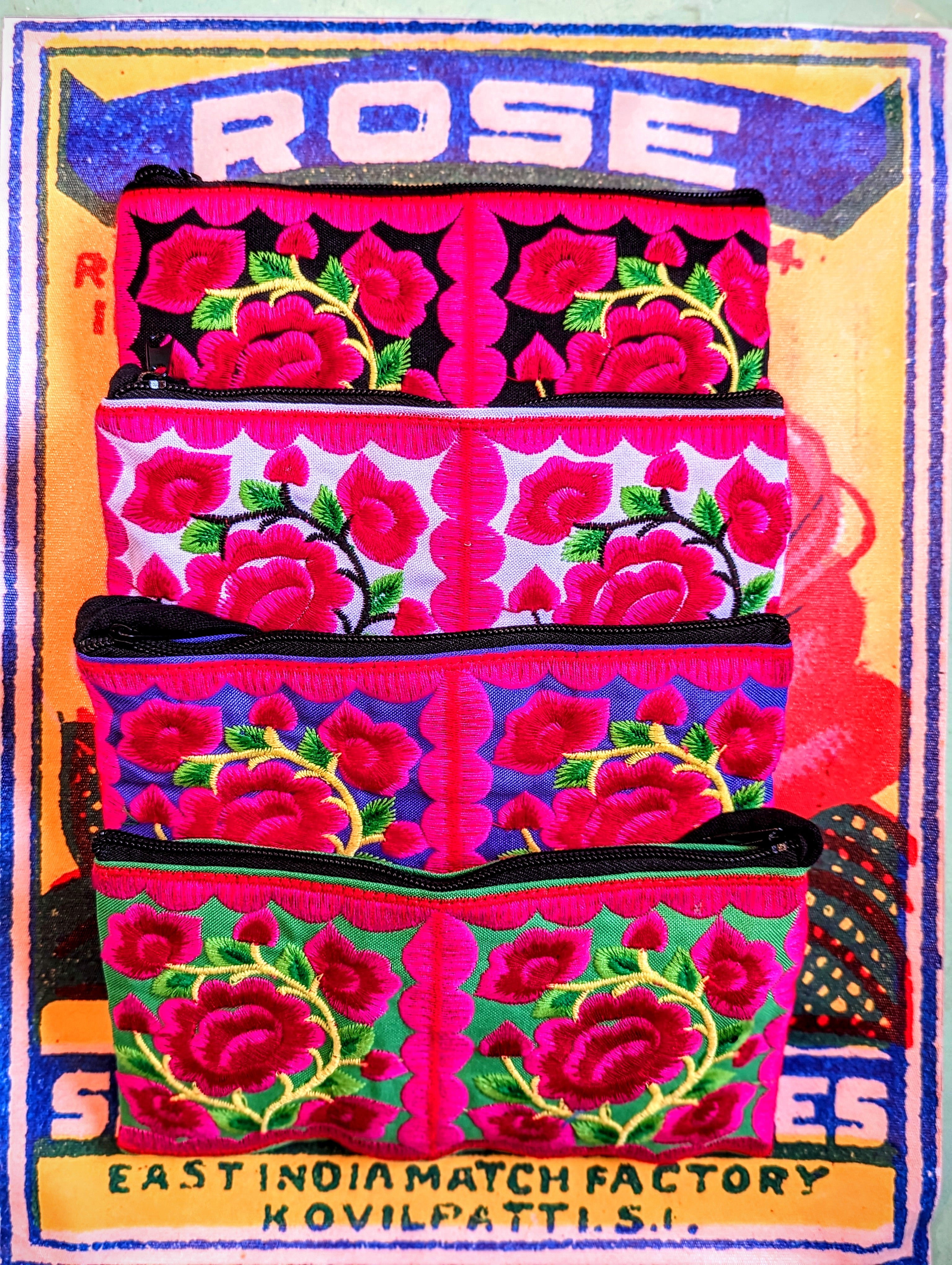 Bigger clutch or large purse fancy and super bright gorgeous embroidered cotton purses made from patches traditionally embroidered for Vietnamese and Chinese Hill tribe baby carriers.

embroidered on both sides

20cm x 11cm

