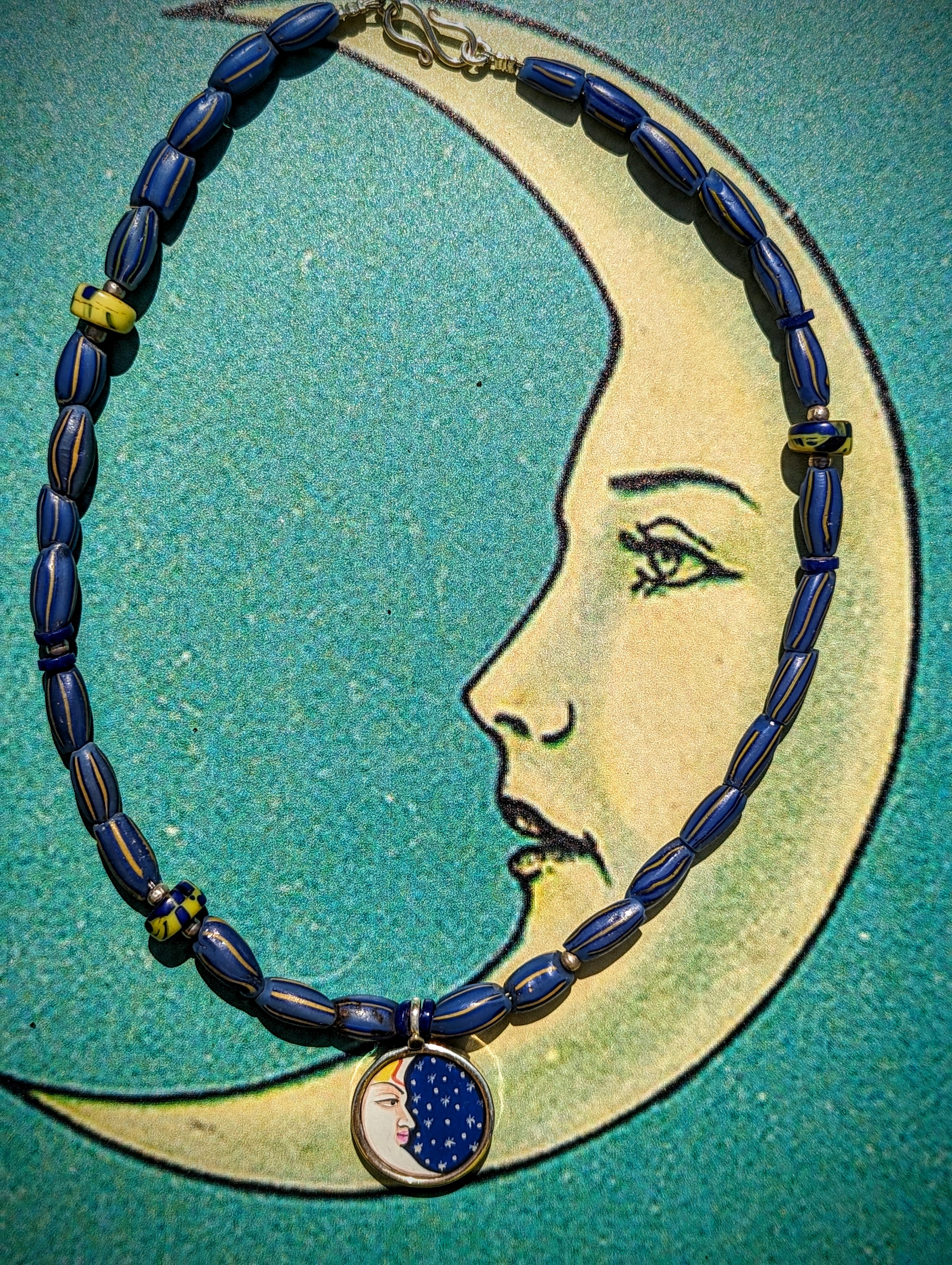 Celestial trade beads with hand painted silver pendants
