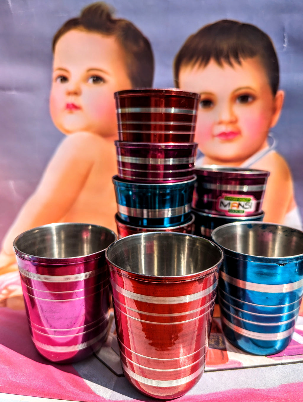 The sweetest baby cups, they jingle to persuade the bab to hurry up and drink so they can play!!

(Make great shot glasses too though!!!)


Stainless steel colour coated cup, not suitable for microwave use, but they are dishwasher friendly!

Some small scratches on cups....India production can be a bit rustic!....and the buying of these takes place in a rough and ready market under a huge tree!!



