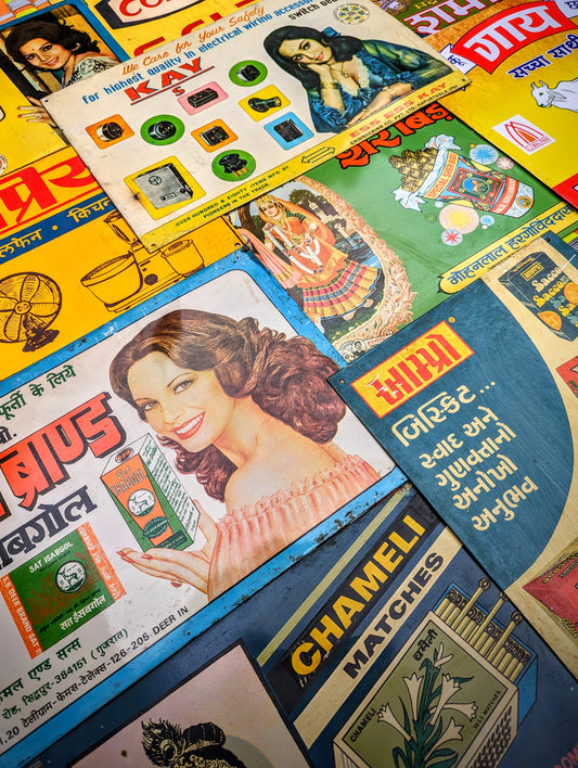 Vintage advertising printed tin signs sourced from deadstock  60s, 70s and 80s shop supply factories in Northern India.These are one of the things we most enjoy hunting for and having up all over our homes!!

So many types of printing, typefaces , graphic design styles and sizes......now which to choose?

Due to their age (and being stored in old factory buildings ) these have rust spots and slight scratching, please check the photos for details.

 

