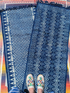 Handwoven cotton rugs resist dyed with natural indigo. These fade beautifully with time and wear like denim. The back of the rug is plain indigo.

Dimensions 160 cm x 50cm

Unbleached cotton, natural indigo 

Washable at 30 degrees,dry naturally. 

Indigo dye way rub off onto skin and surfaces,it will wash out as it is notoriously difficult to fix, but we would advise not to put it onto a cream carpet!

The indigo will give out less as it is washed and used.

 

 

 

 

