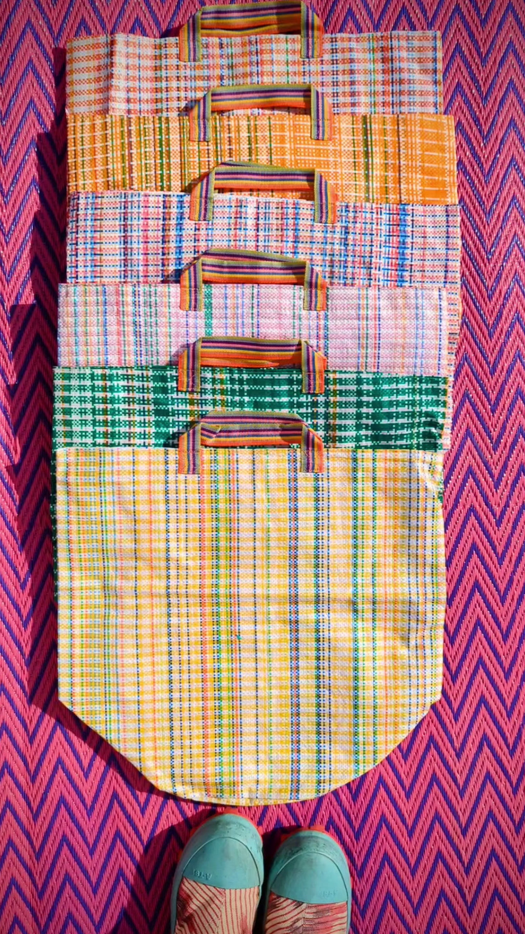 Cutest, practical round bottomed bag, fantastic for shopping, laundry, recycling or swimming! and made with fantastically brightcolour handles

Made with recycled packaging sacking in the best checks!!

40 cm x 40 cm x 25cm plus handles

 