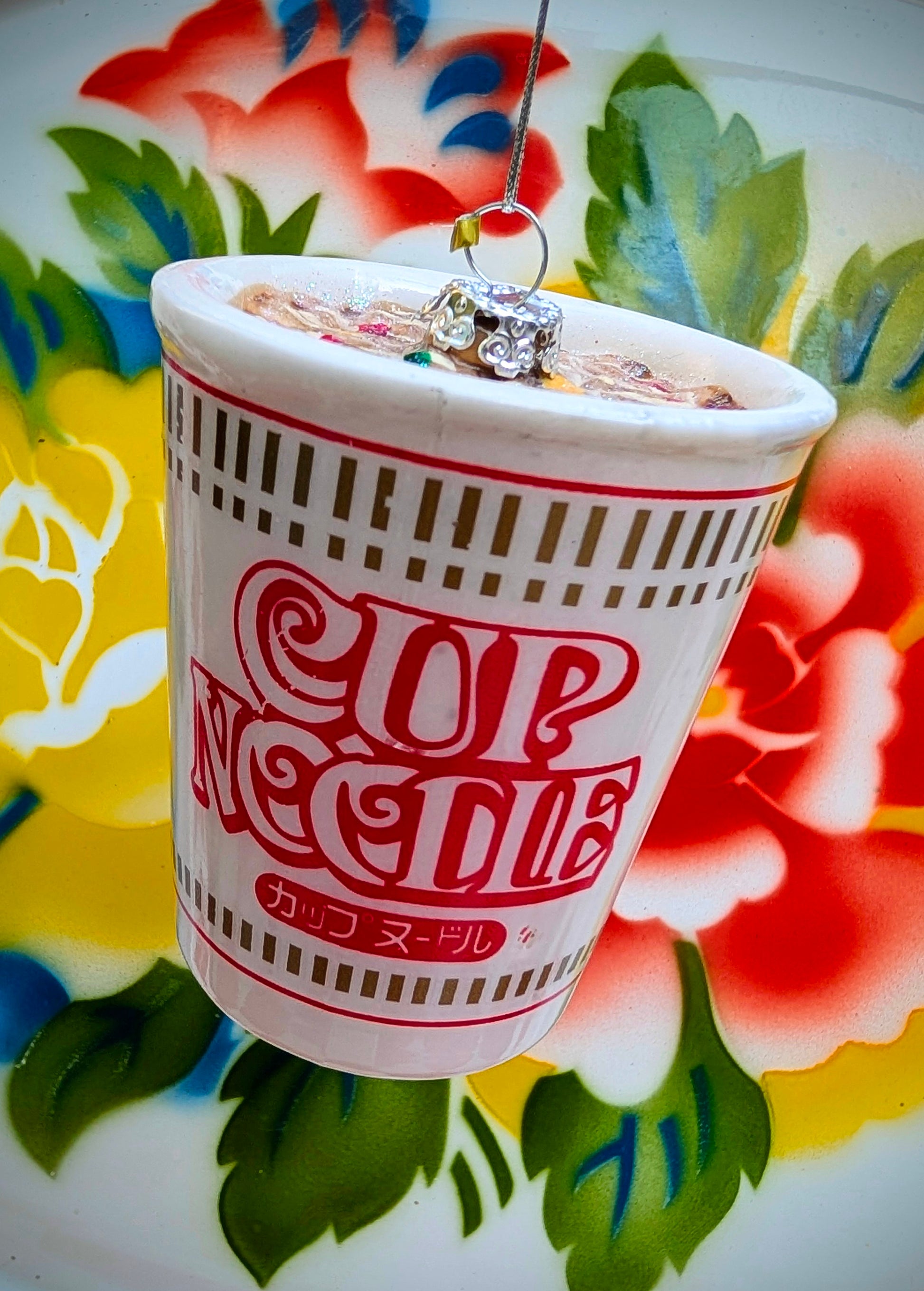 A firm family fav in many student households....a kitsch  iconic larder staple!

Glass, glittered hanging ornament.

9cm x 7cm x 7cm

Glass handle with care.