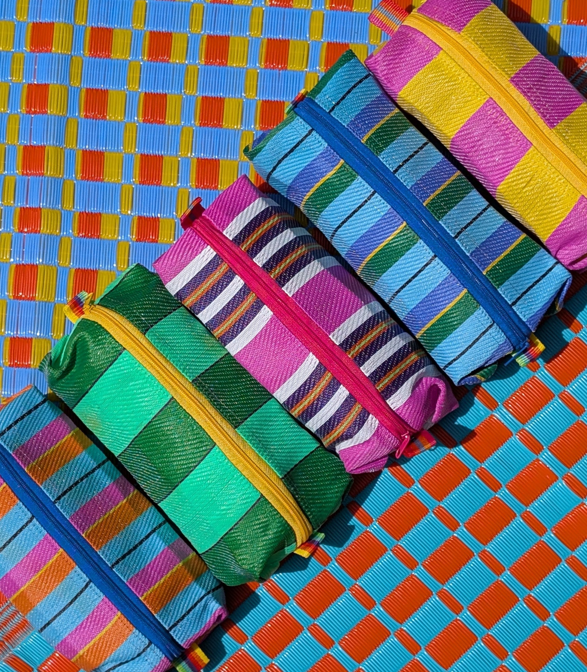 Gorgeous seaside deckchair stripes recycled woven plastic pencil , glasses or make-up cases... whatever you need them for!!

Length 18cm

Height 5cm

Depth 9cm