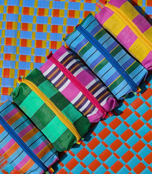 Gorgeous seaside deckchair stripes recycled woven plastic pencil , glasses or make-up cases... whatever you need them for!!

Length 18cm

Height 5cm

Depth 9cm