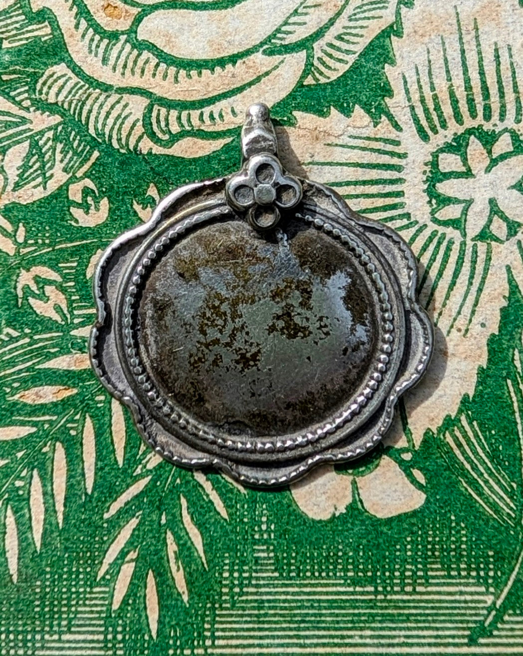 Antique silver floral pendants