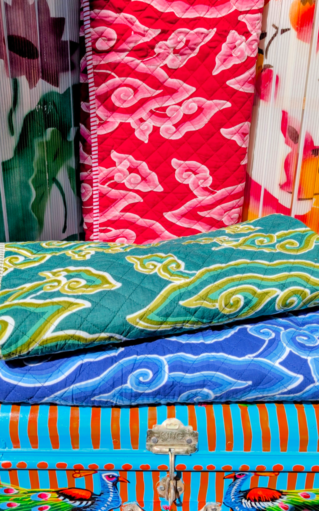 Softest pure cotton quilt with our gorgeous clouds print, based on the amazing Indonesian covering clouds batik - Mega Mendung, piped and backed with matching stripes.

Would be great on a baby's or child's bed, or as a comforter on the bottom of a double bed and we have them for a winter telly blanket too!!

Dimensions 135cm x 95cm

Pure cotton outer,  poly filling.

 

When washing, add half approx 500g of table salt to the first wash to fix the dying.

 

 

 

 