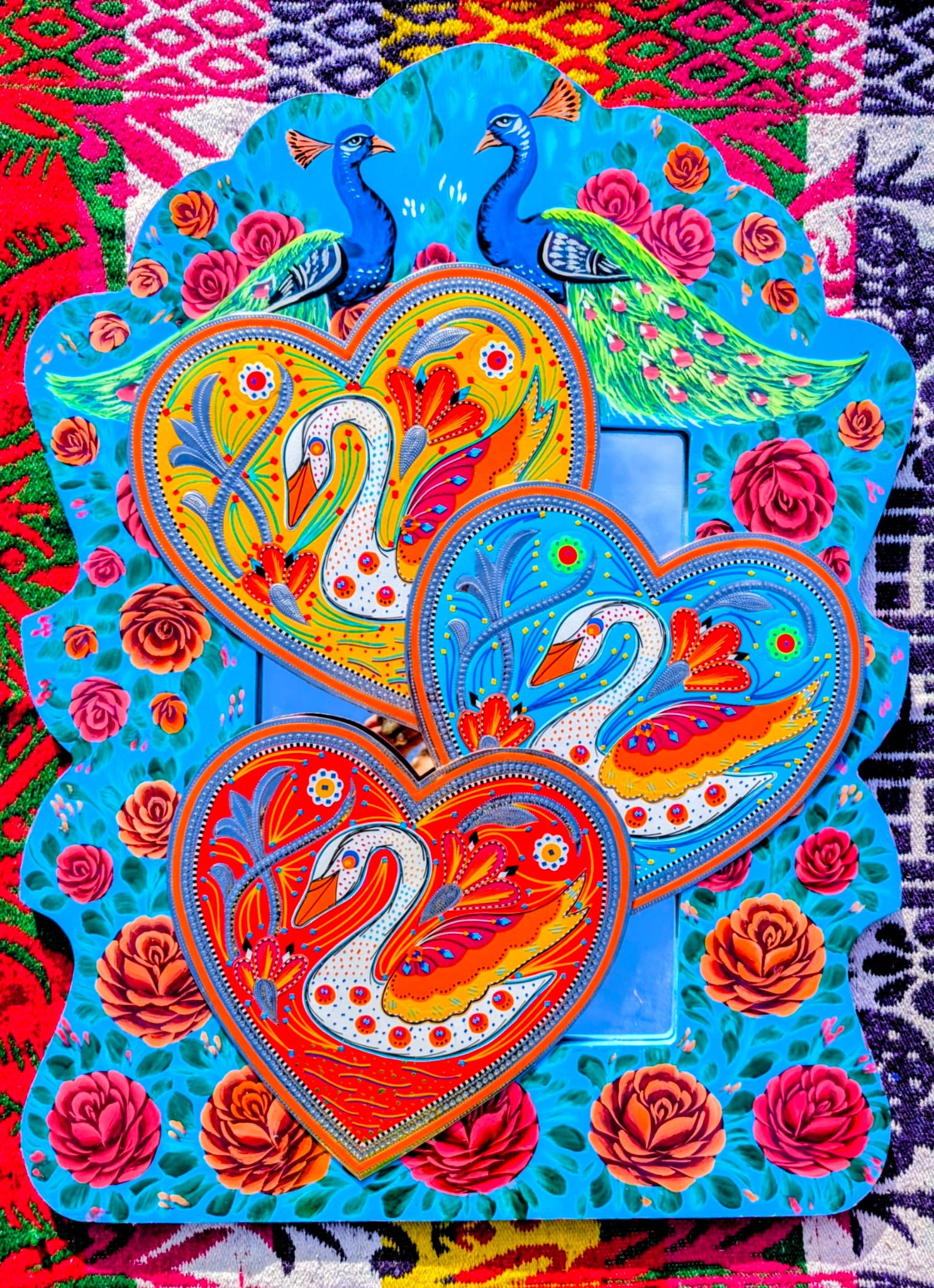 Stunning, sturdy metal love hearts, hand punched and decorated with true loving swans, depicted in razor cut vinyl by the truck artists of Pakistan

These traditionally are used to decorate the trucks outside or in, and are really beautifully made.

30 x 30cm

Chromed steel, vinyl sticker, fabric backed.

 

 