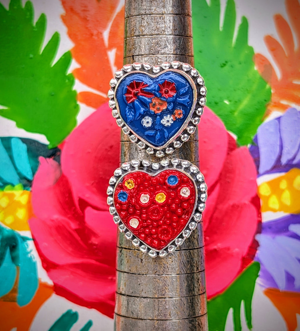 Well....when we found these vintage European glass, hand painted buttons, we knew exactly what we were going to make with them!!

Lovely bobbled halo around the symbol of love!

925 Silver and glass

Heart buttons are 1.8cm diameter.

Remove if washing.