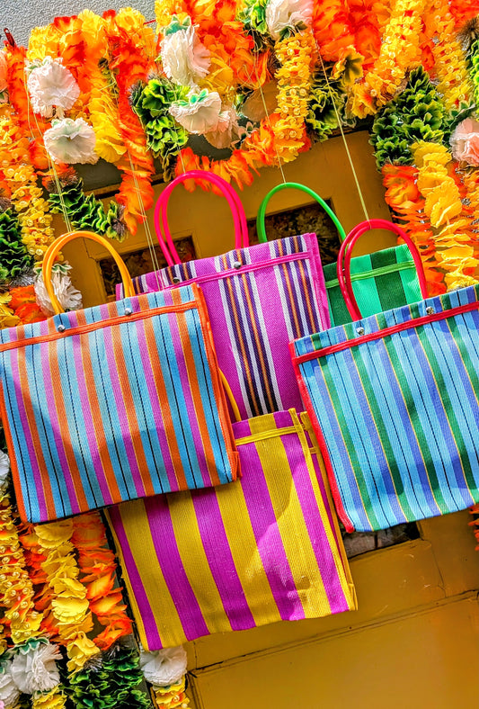 Cutest, practical squared shopping bag, fantastic for shopping, laundry, recycling or swimming! and made with fantastically brightest coloured, comfy handles

Made with recycled woven plastic in the best deckchair stripes!!

Approx 35 cm x 37cm x 12cm plus handles

 