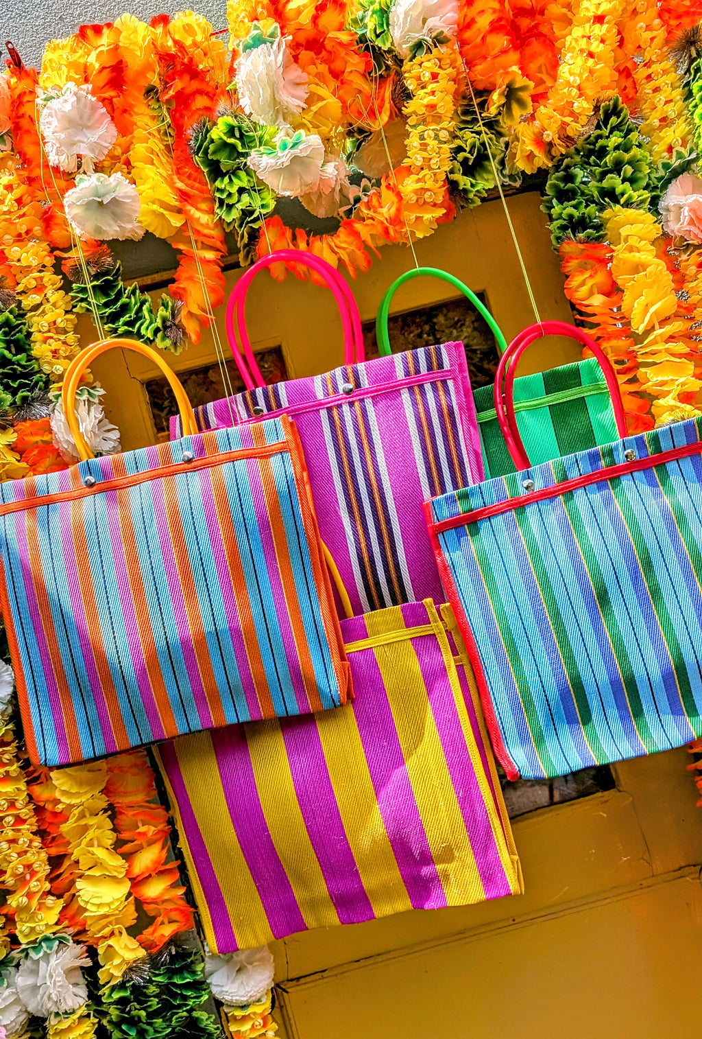Cutest, practical squared shopping bag, fantastic for shopping, laundry, recycling or swimming! and made with fantastically brightest coloured, comfy handles

Made with recycled woven plastic in the best deckchair stripes!!

Approx 35 cm x 37cm x 12cm plus handles

 