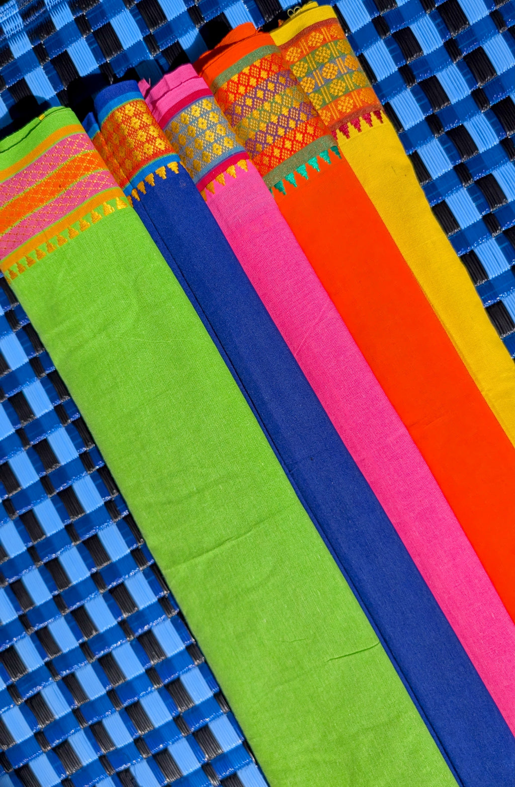 Woven, bright, joyful, shawls in the best colours to brighten up your outfit or use in the sun for sarong style cover, or even to colourfy your home on a chair or table.

Polycotton 225cm x 120cm

Woven in India, traditional style with raw edge ends.

Wash in machine or by hand at 30 degrees. 

 
