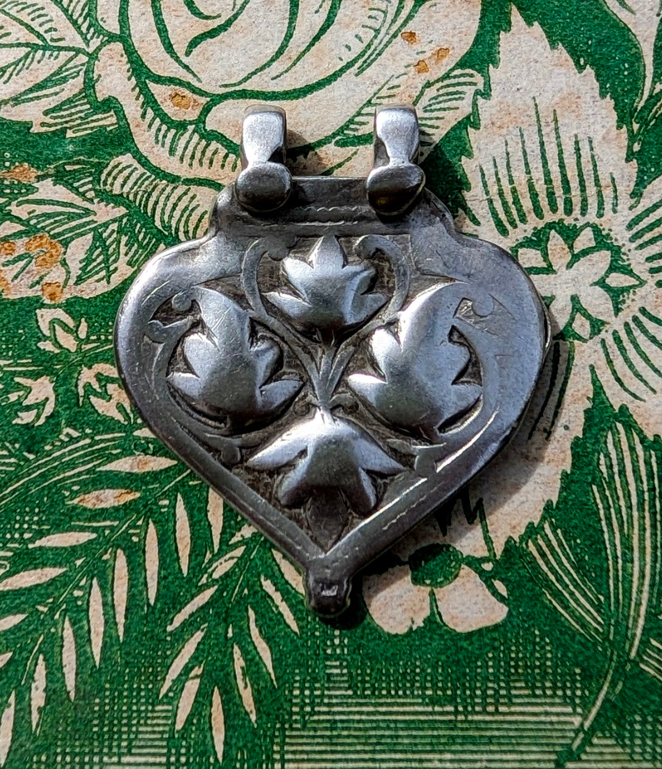 Antique silver floral pendants