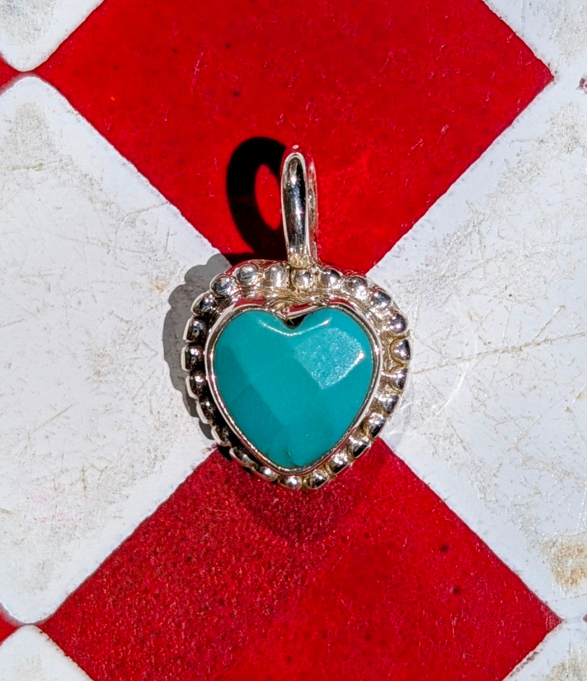 Heart stopping heart pendants