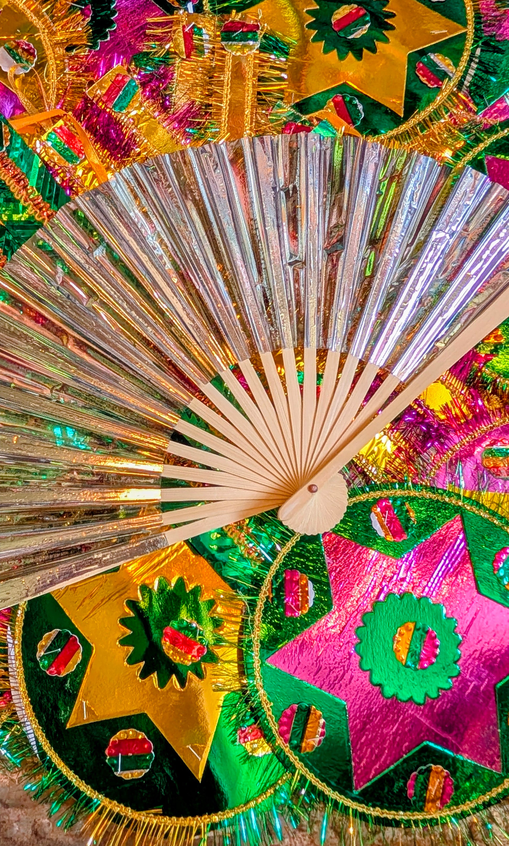 Super shiny silver fans for dancing, parties, festivals and steamy menopause moments!!

Love that these are a space age update on a traditionally made bamboo frame fan!!

Also make fabulous display pieces on hooks, walls or shelves.

Bamboo and plastic foil.

Open 42.5cm x 26cm approx 