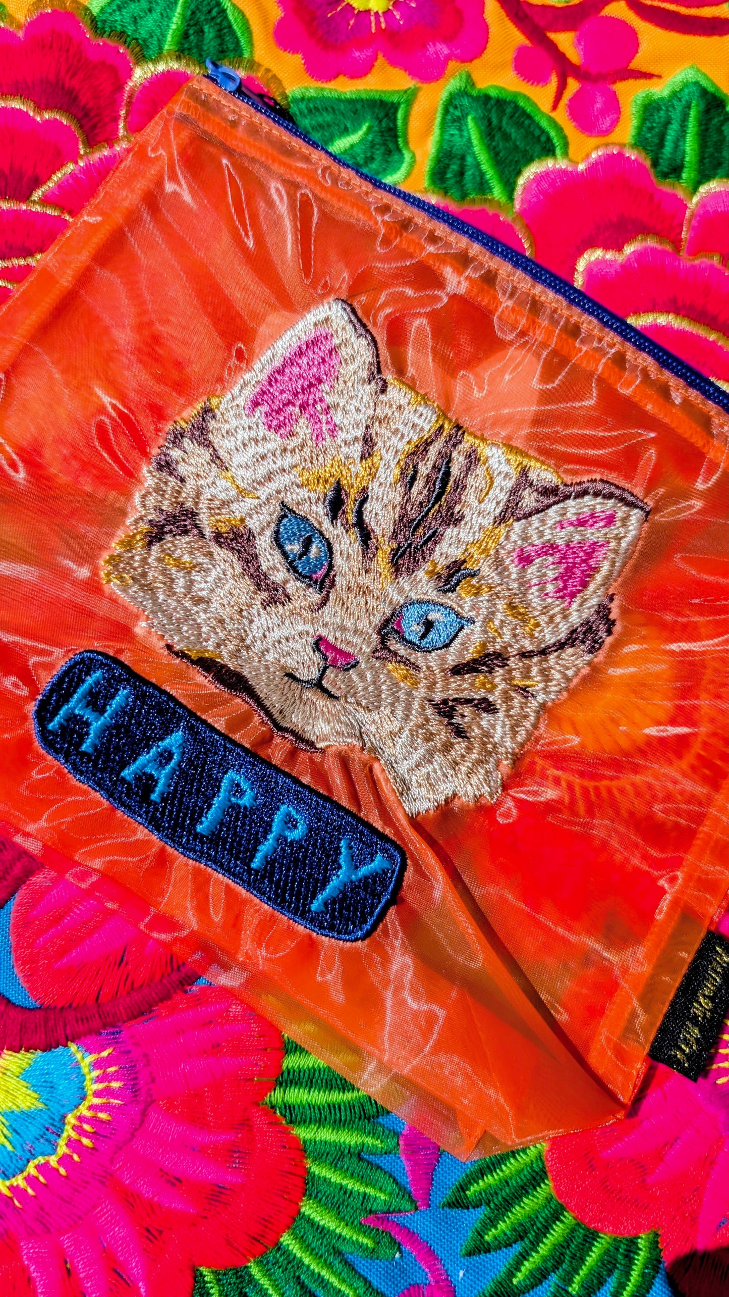 Embroidered puss pouch