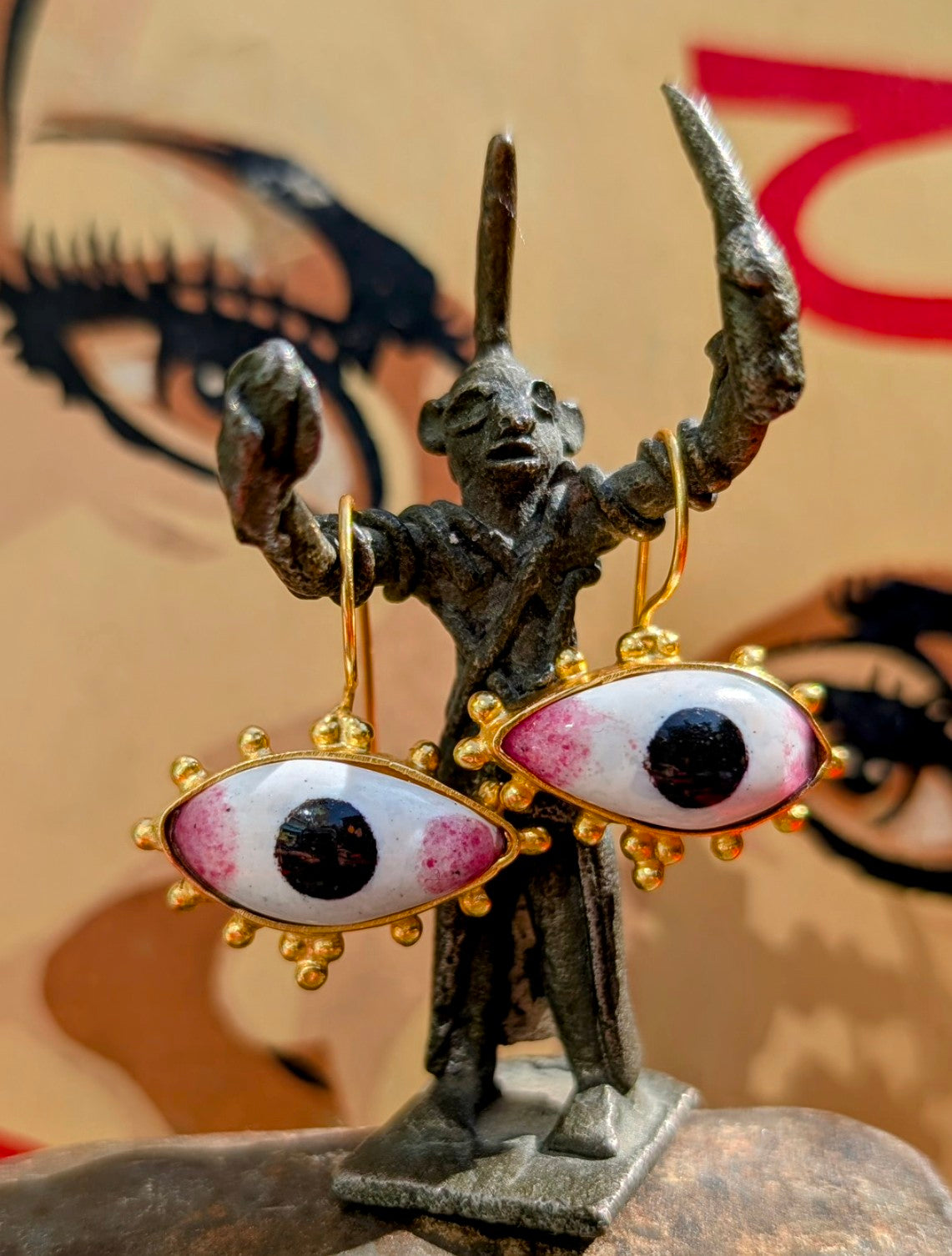 Enamelled god eyes