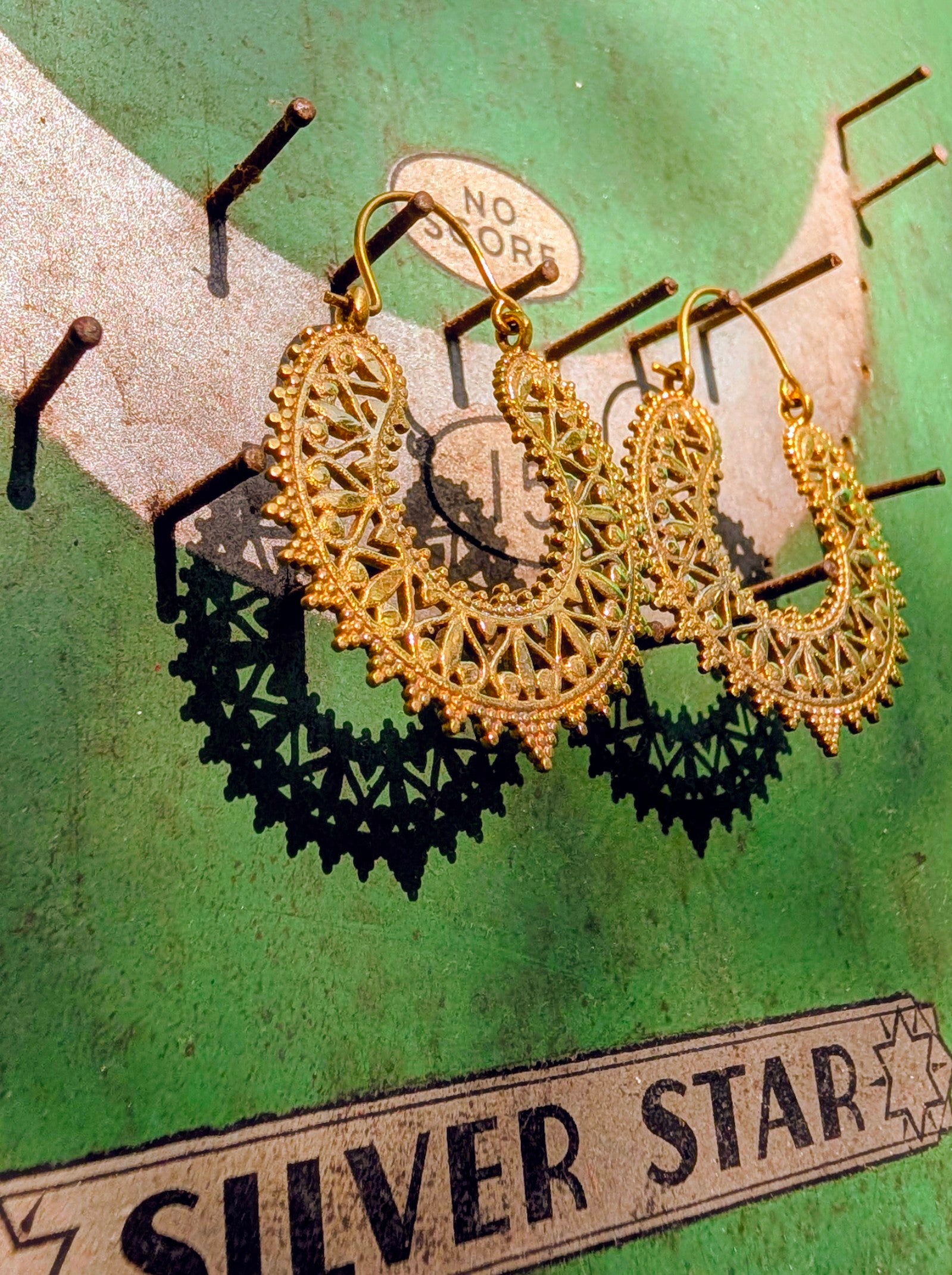 Fancy brassy Indian hoops