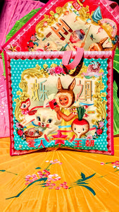 Bags of joy !!🌈 Printed canvas bag in the most vivid colours. Super kitsch to brighten up any trip to the green grocers!
The image appears on both sides of the bag, and with bunny gal one side is green and the other side is pink, whats not to like!!
 Size 40 x 38 X 15cm approx 
Wipeable
Fiona Hewitt
Dumpling dynasty 