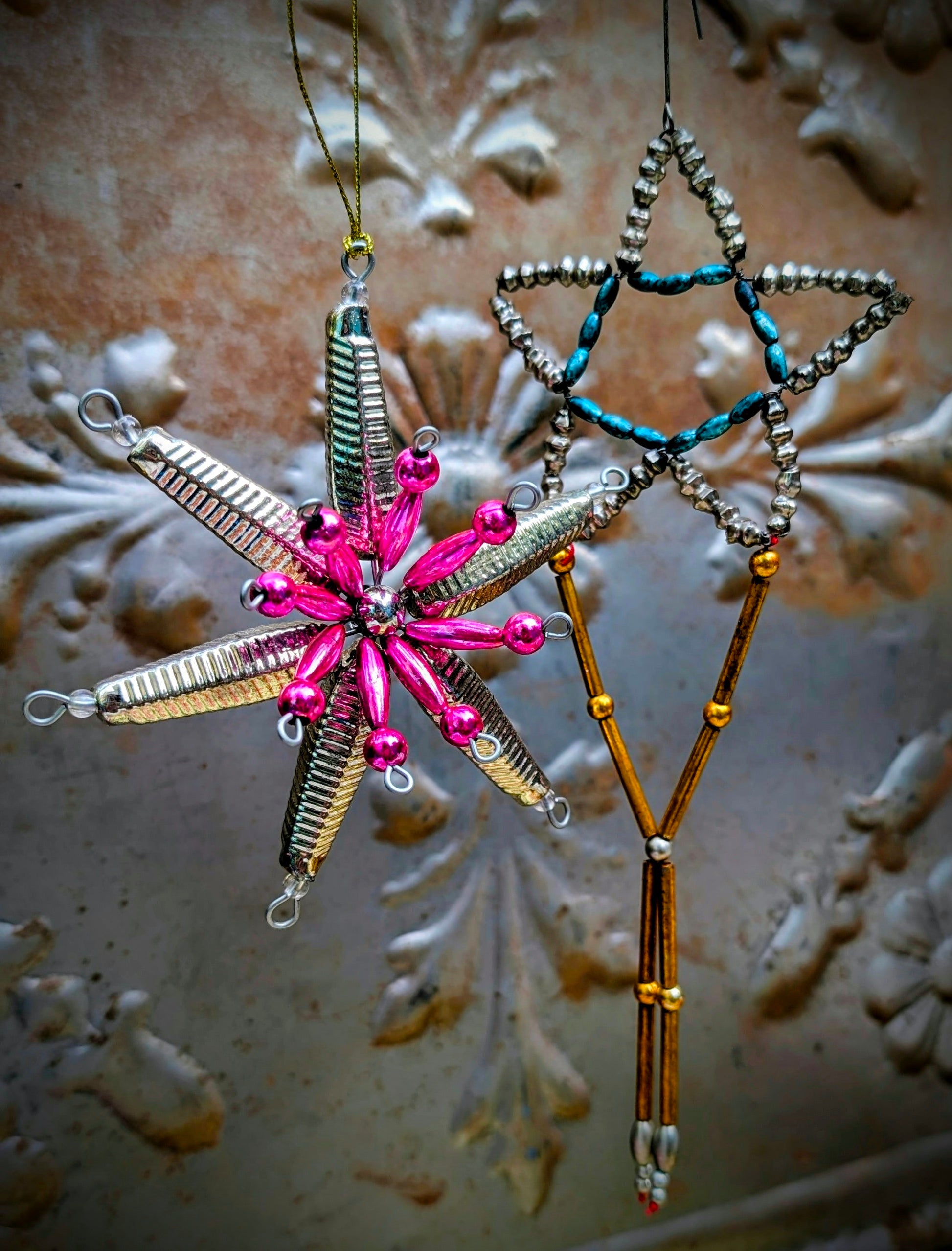 Vintage style celestial beauty!!!  A gorgeous starry addition to your celestial Christmas tree or festive holiday display.

Hand finished glass bead decorations.

Pink star  size 13 x 13 x 4cm

Shooting star size 22cm x 9cm x 3mm

 

Size 16 x 8 x 4cm

Fragile, handle with care
Cody foster & co
