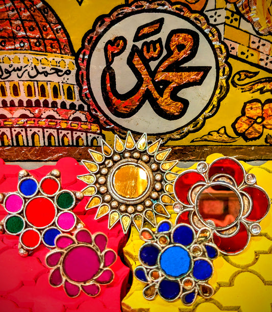 We absolutely love the super decorative hand cut mirrorwork decorations in Rajasthani shrines and these tribal flower and star shaped rings from the same region are absolutely amazing!!, worn and made by the beautifully stylish and adorned nomads who move the animals across the desert through the seasons.

All rings are adjustable size.

Hand cut mirror set in white copper.

 

 

 

 