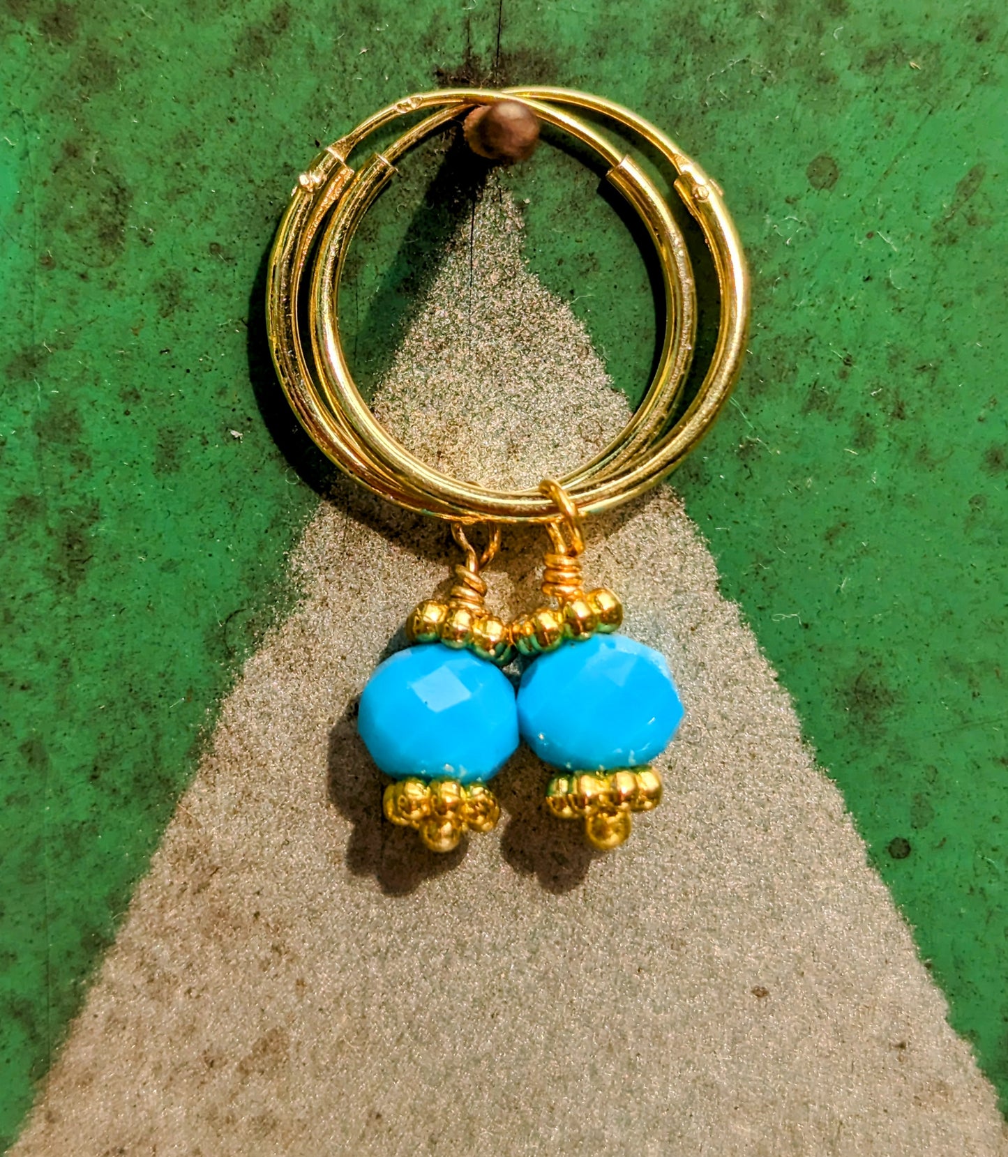 Swaro gold plated hoops - round