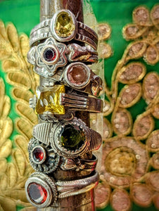 1980s Rajasthanil rings, handmade in and around Pushkar from silver with brightest glass stones, worn for their bright colours!
Listed from top to bottom.
These pieces vary in wear and tear, so please examine images!

Tribal antique silver traditionally has no hallmarks, but all that we sell have an 80-90% content, as these pieces would have been historically made from old melted down jewellery and coins.  