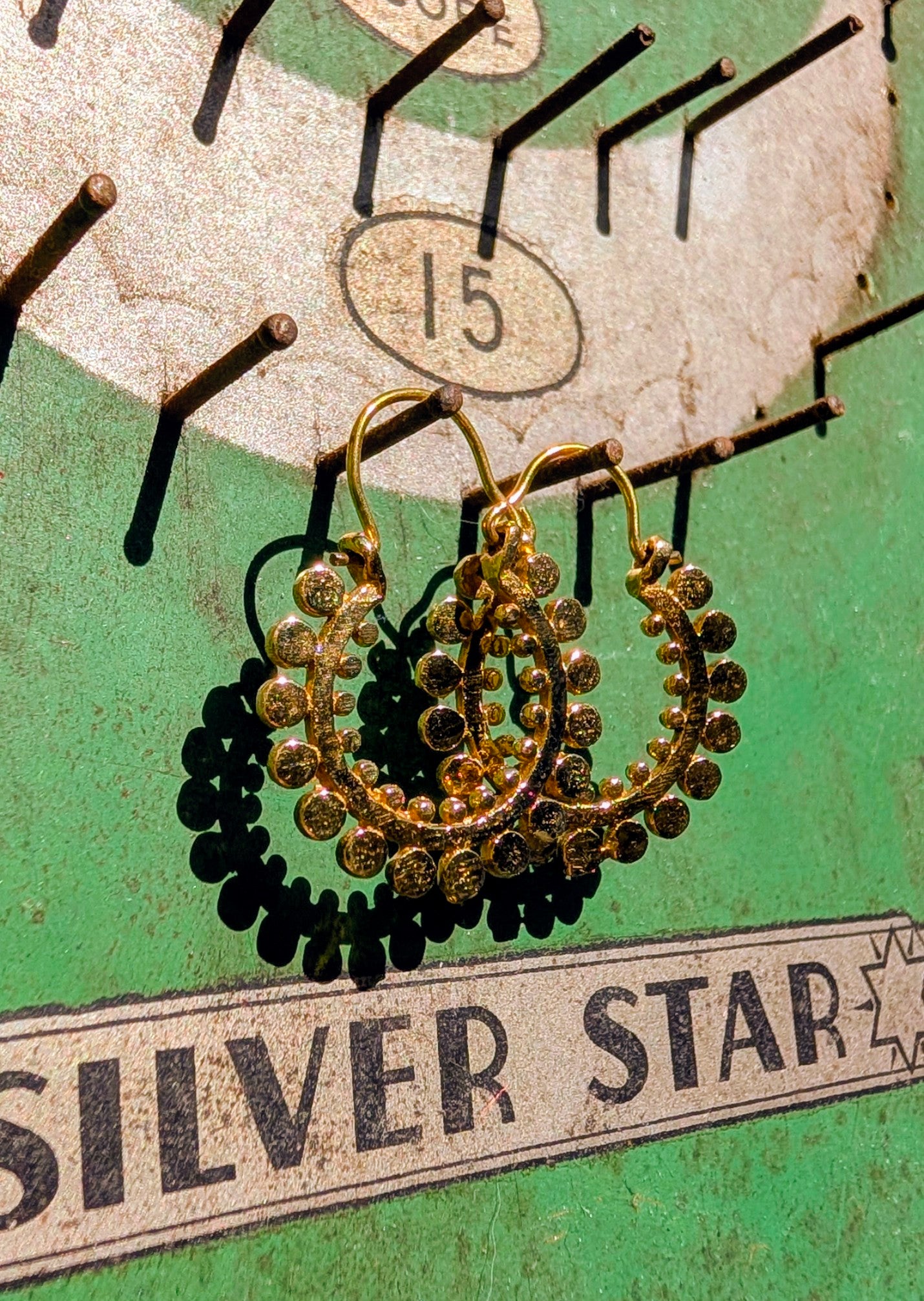 Fancy brassy Indian hoops - small