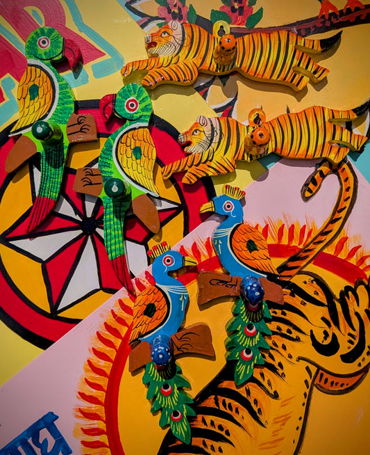 Skillfully handpainted wooden hooks all the way from the talented artisans of Rajasthan.

Great hooks for towels, jewels, scarves, jackets and a whole host of things!!!!

Available in parrot, tiger and peacock designs!

Sold in pairs. 

Parrot 17 x 8 cm

Peacock 16.5 x 7 cm

Tiger  20 x 6cm

 