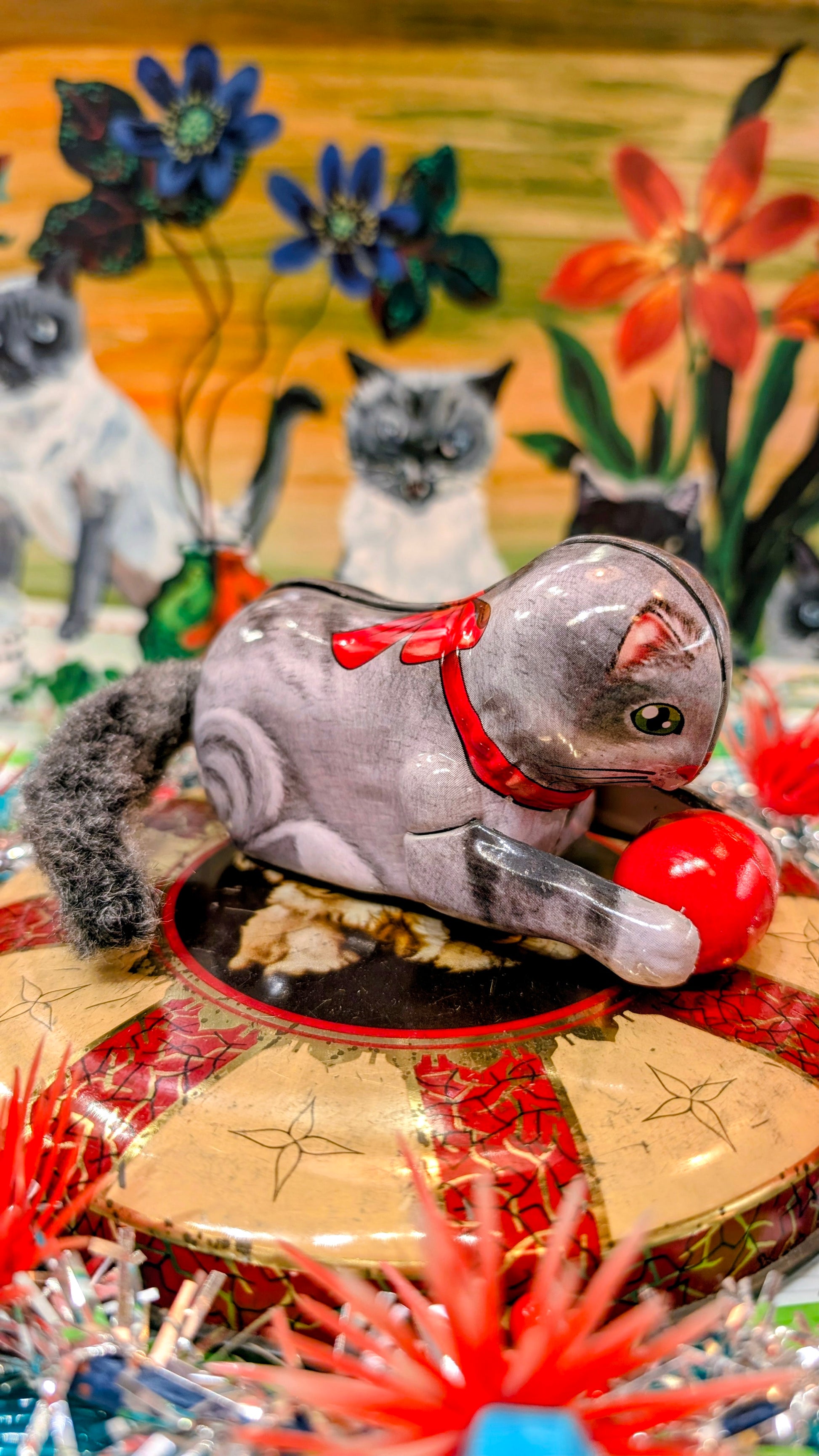 Off they go, in the cutest red bow, to play and roll over again and again with their toy, just like a real puss!!

Gorgeous to look at, the most fun, and a fab box too.

12 x 5 x 5cm

Not suitable as children's toy as made of tin with small parts.