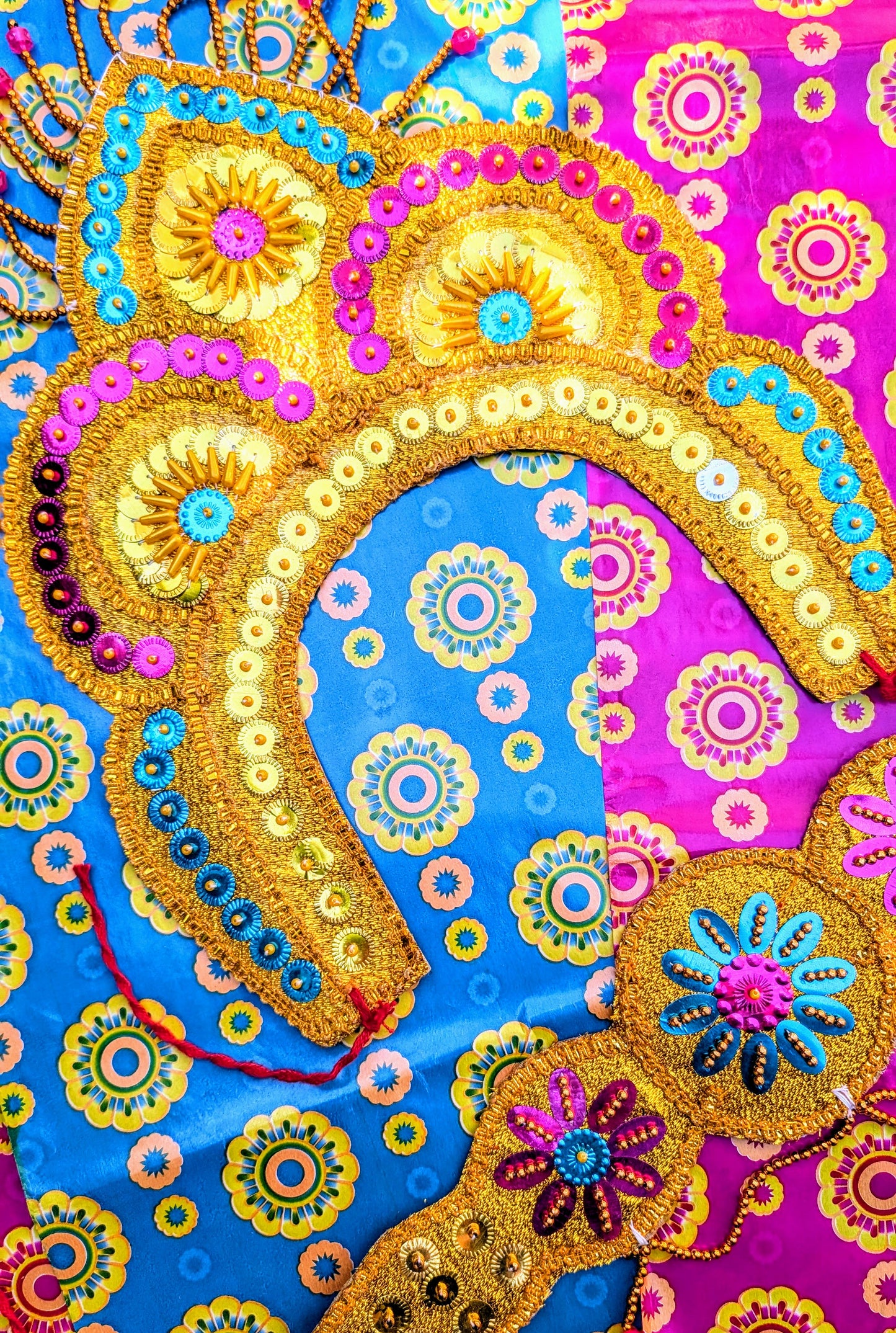 These fabulous creations are used on street festivals in India to dress up as Hindu Gods and Goddesses!

Wear them for parties, high days and holidays, or dress your statues and Christmas trees!

These come with string, but you will need to tie ribbon or elastic onto them to wear on their own. The belt also looks fabulous worn around your head!

Crown 35 x 29cm

Belt 50 x 13cm

Made from sequins, lurex, card and plastic.

 