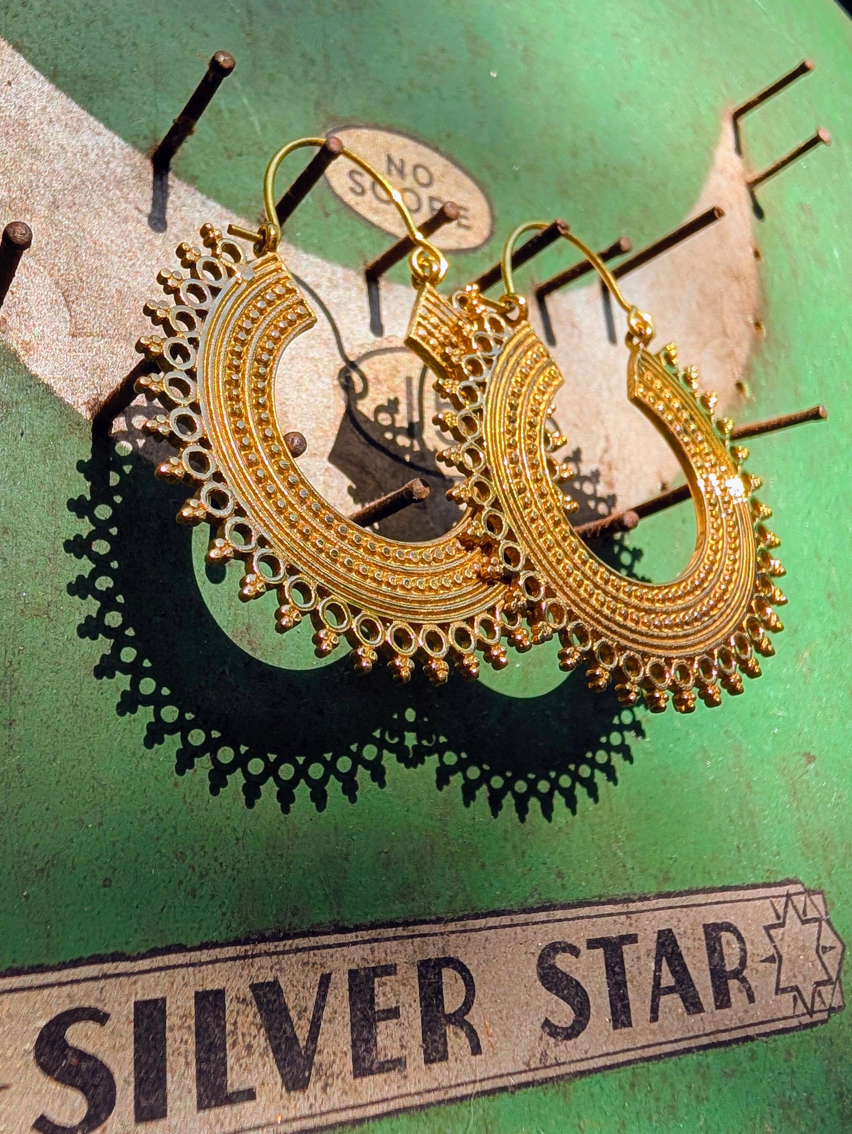 Fancy brassy Indian hoops
