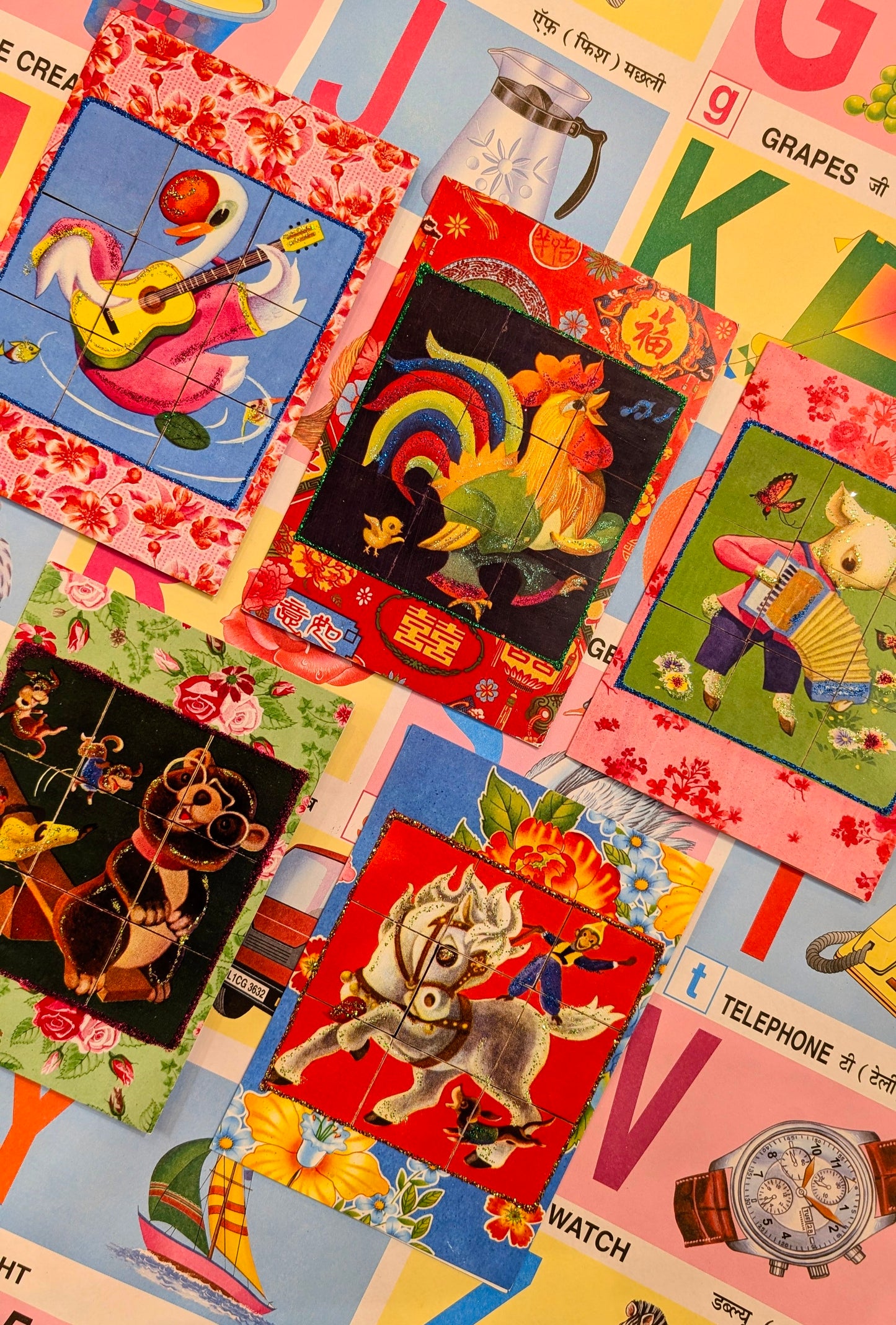 A set of five hand glittered greetings cards of animals from a vintage Chinese block game, with seriously gorgeous illustrations!!

Set of 5 cards with coloured envelopes, blank inside.