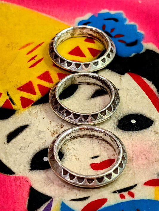 Gorgeous new heavy triangular stamped, and angle profiled rings.
Many of these Karen ring designs stack together beautifully.
All pieces are hand made and hand finished using traditional methods.
Unusual profile shapes look fantastic stacked showing their various patinas. The texture in these pieces show the malleable nature of this almost pure silver.

Hill tribe silver has a higher content of silver, at 99.5-99.9% compared with sterling silver at 92.5%. This allows the silver to wear and soften differentl