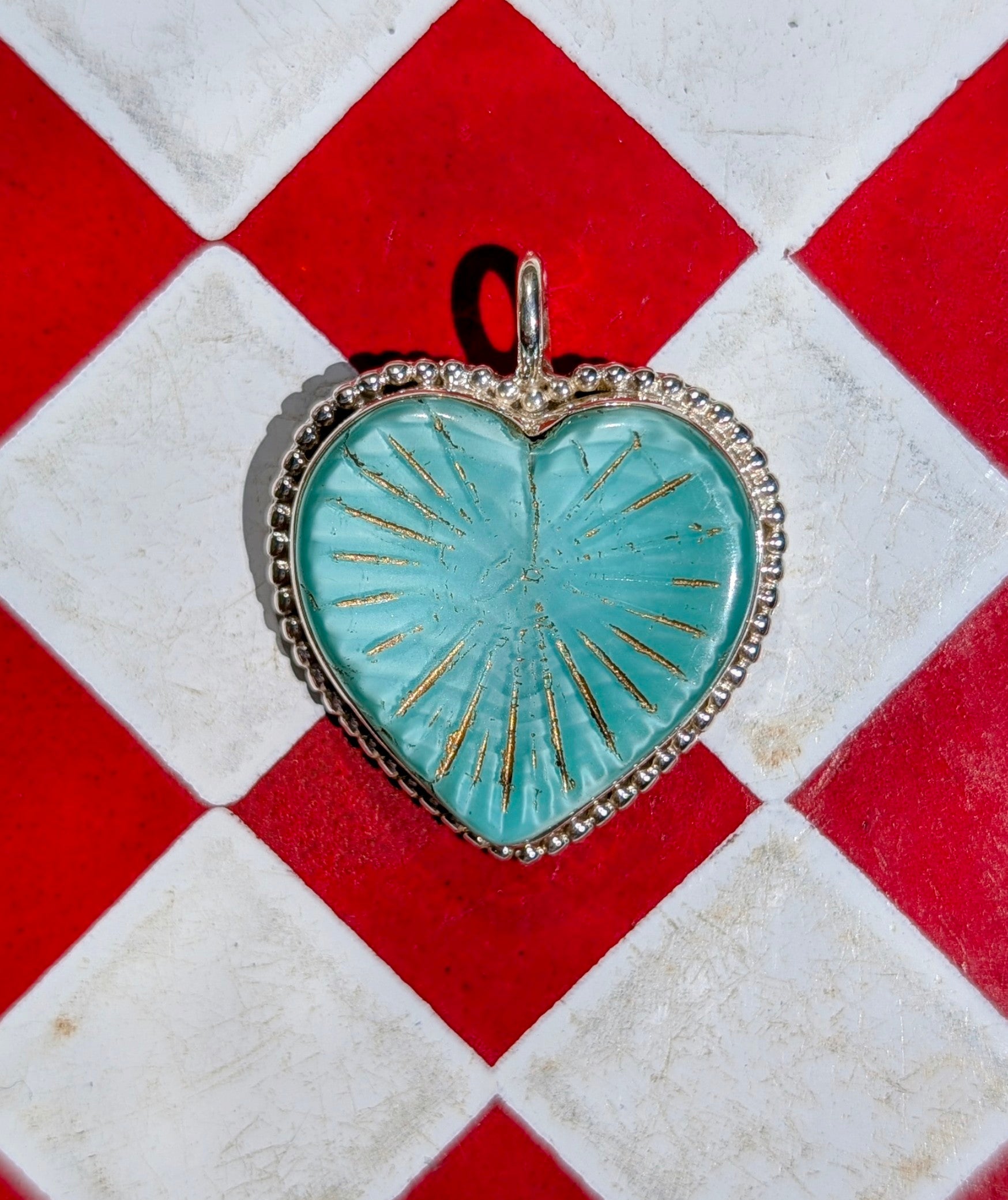 Heart stopping heart pendants