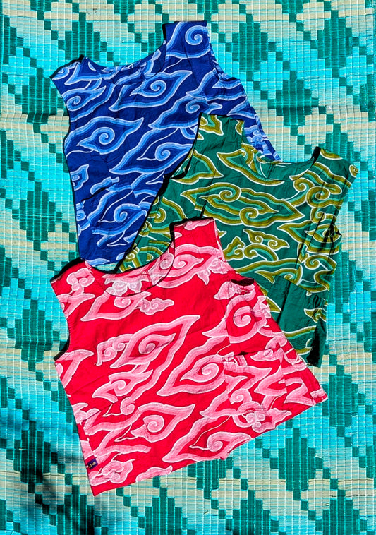 Gorgeous soft fine cotton cool summer tops with a fabulous Indian print inspired by our favourite Javanese batik pattern, mega mendung (the clouds that cover the sun).

Patterns and sampling made here in the UK by our founder Anna Moody.

Measurements

Size 1-  34"bust, length drop from shoulder 19" (UK 10-12)

Size 2- 38" bust, length, drop from shoulder 20" (UK 12-14)

Size 3- 40" bust, length, drop from shoulder 21" (UK 14-16)

 Washing instructions....

To properly fix the colour print with the natural 