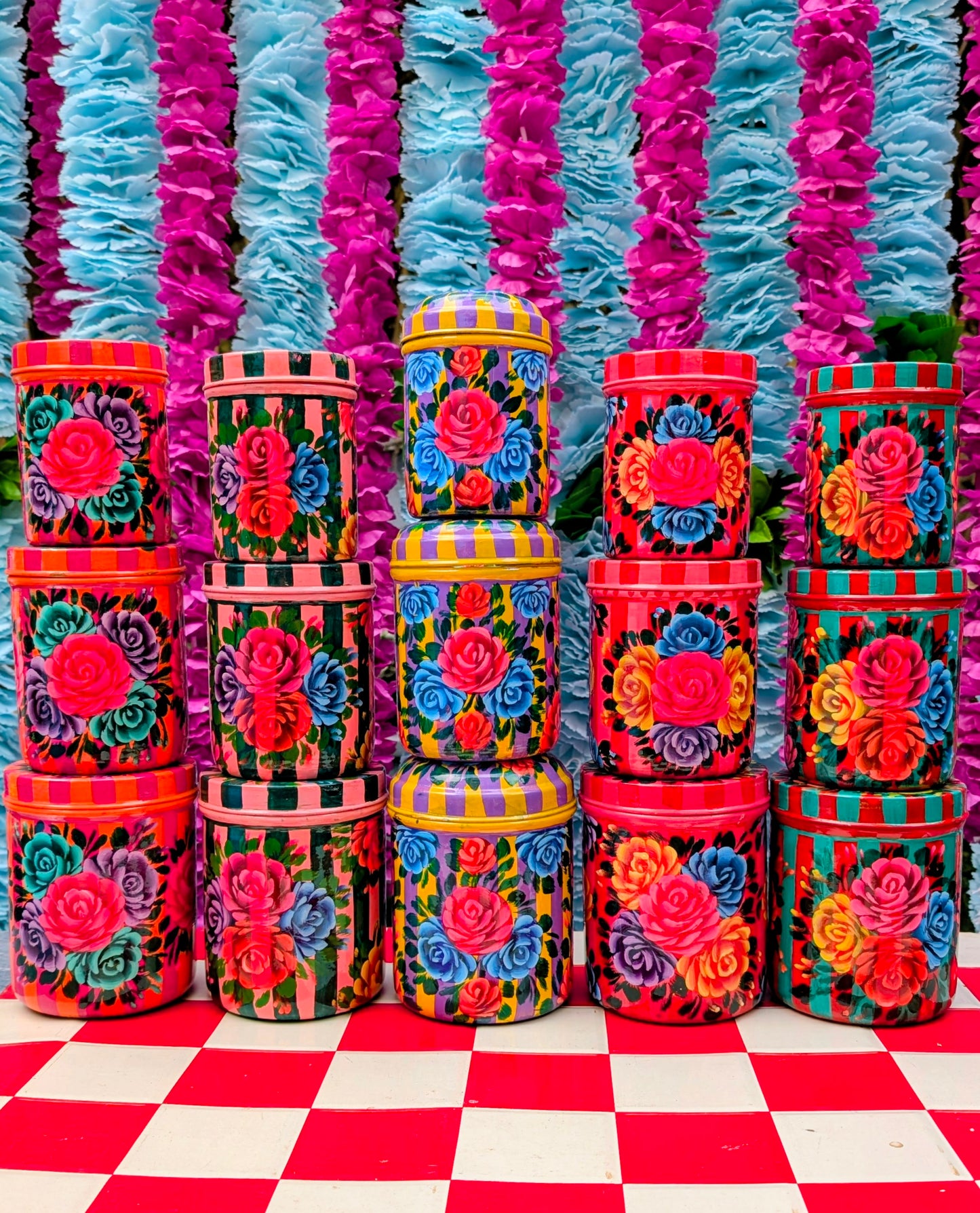  Handpainted in Pakistan by the artisans that paint the fabulously flamboyant trucks! These stainless steel canisters are painted with the most beautiful, traditional flower designs with heavy duty enamel paints.

Perfect for tea/coffee/sugar....spices, baking bits, or jewellery and other treasures.... menopause meds, or washi tapes.......🤣🌈Suitable for light cool water washing only.

Due to their handmade production, designs may vary and also have imperfections.

Approx sizes
Small 11 x 8 x 8cm
Medium 11