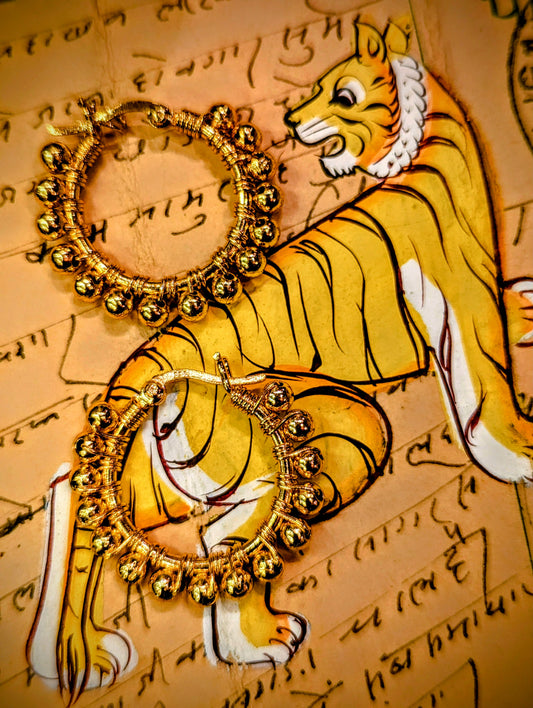 Fancy, hand beaded gold plated hoops