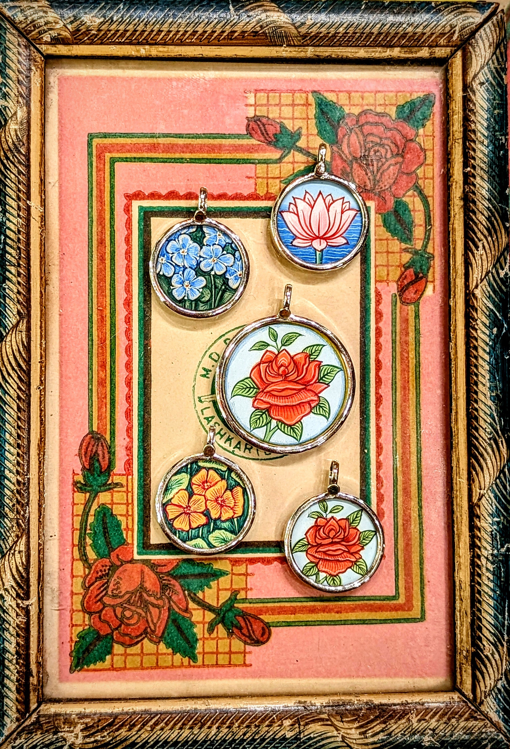 In the language of flowers, the rose is true love, the lotus is rebirth, purity and strength, the nasturtium is joy, creativity and wellness, and the forget-me-not is true love and memories
Made in Rajasthan, these pendants are crafted from sterling silver, glass and hand painted images on paper. The fine craftsmanship in these paintings is mind blowing, painting with single paint brush bristles!!!

These pendants should be removed when washing/swimming etc as they are in effect framed pieces of art, that a