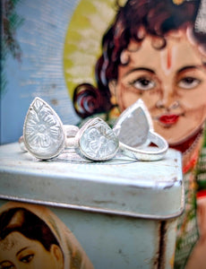 Floral carved aquamarine rings