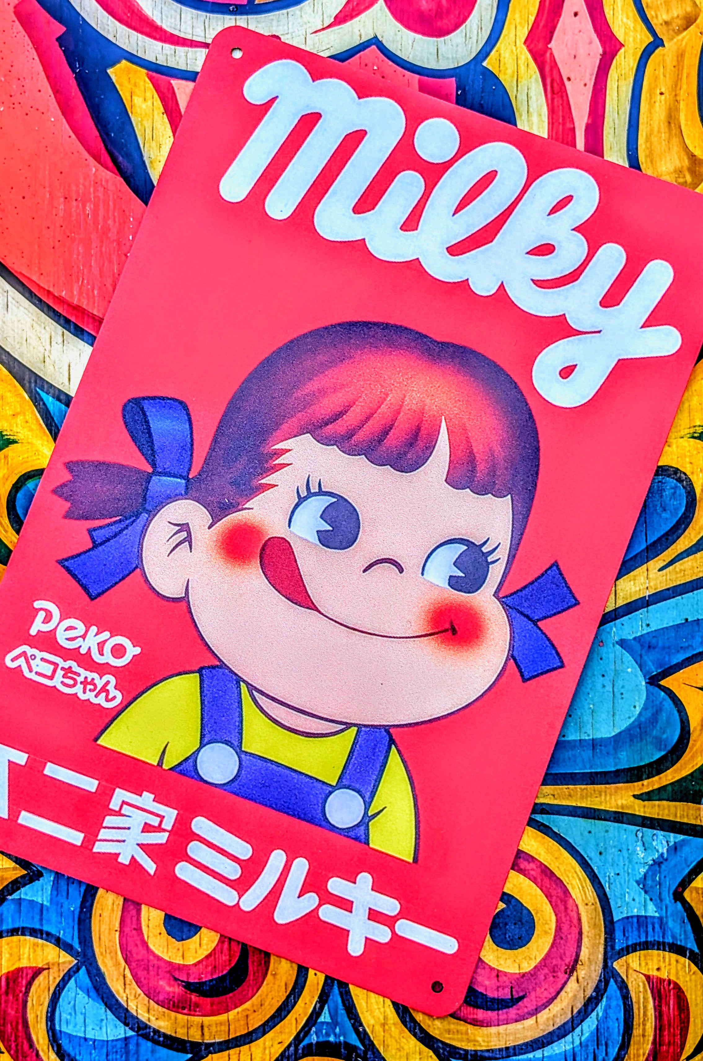 Milky sweets tin signs