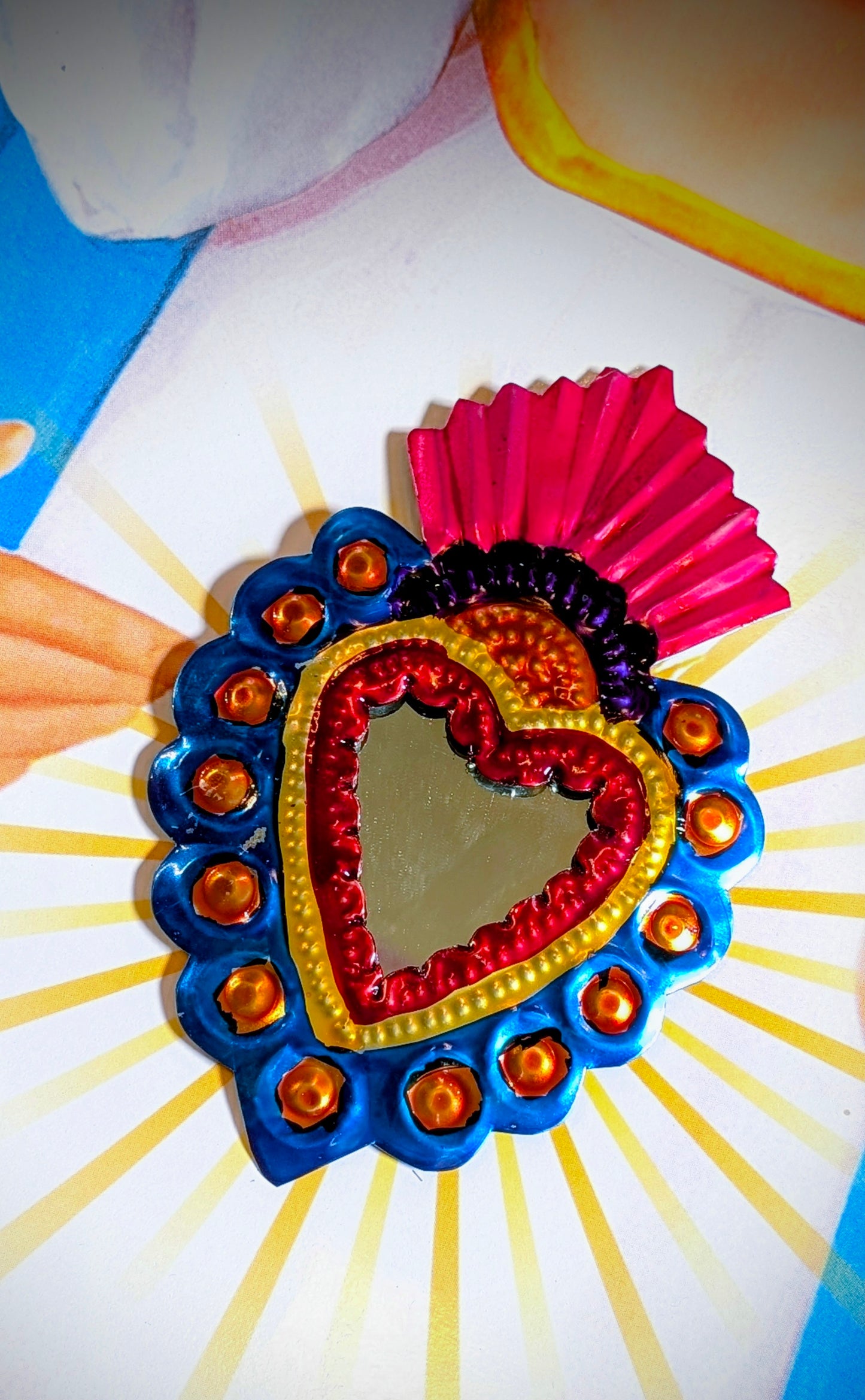 Colourful tin sacred heart mirrors
