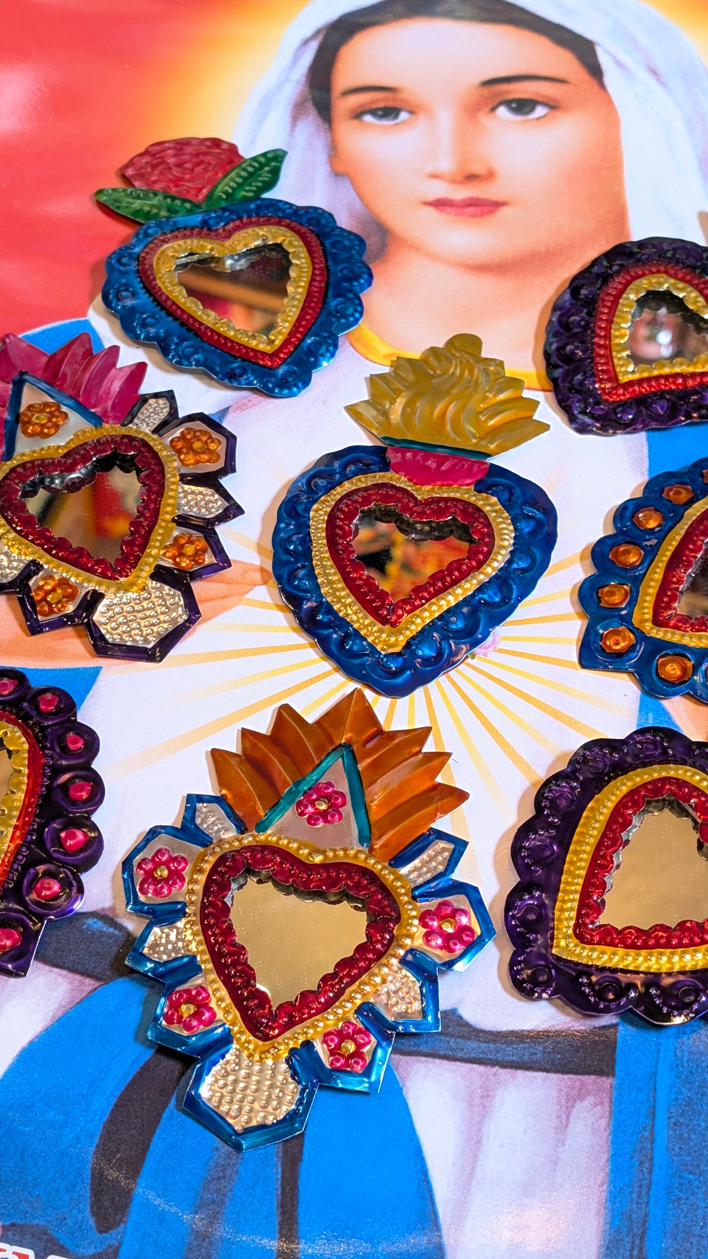 Colourful tin sacred heart mirrors