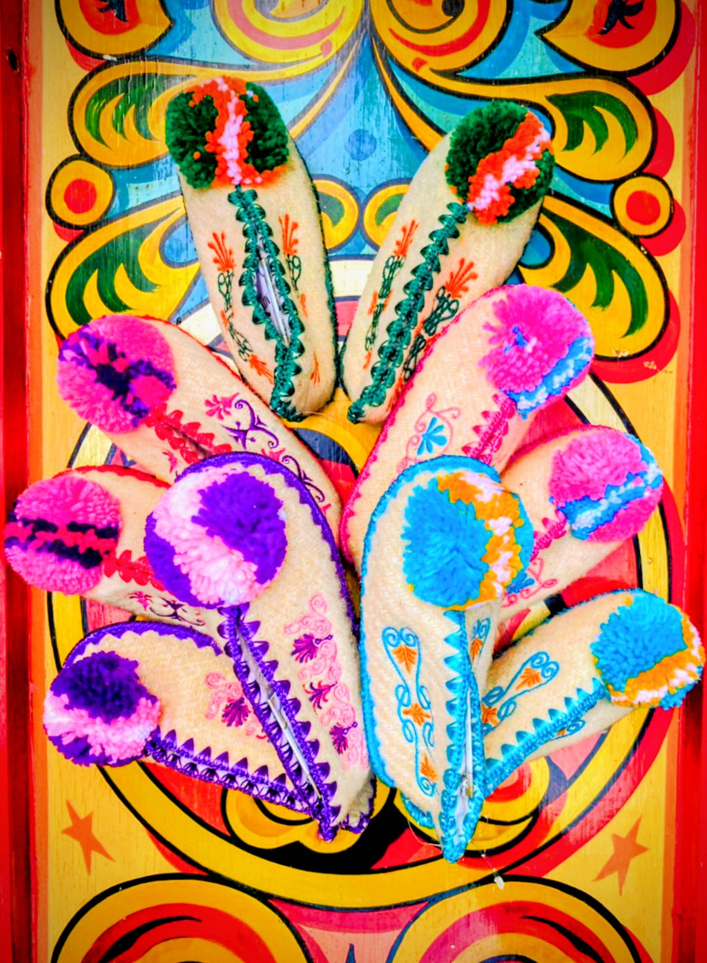 Practical and gorgeous, super cute kids slippers,handmade in Greece. Years ago we would buy them directly from a lovely old lady who would even hand embroider them!!!! Sadly those days are no more, but these are just as fantastic, with the only difference being that they are now machine embroidered.

Super comfortable with a practical non-slip suede leather sole which is durable and waterproof yet still flexible and breathable. Made from sheep's wool and lined inside with soft man-made fur and cotton blend 